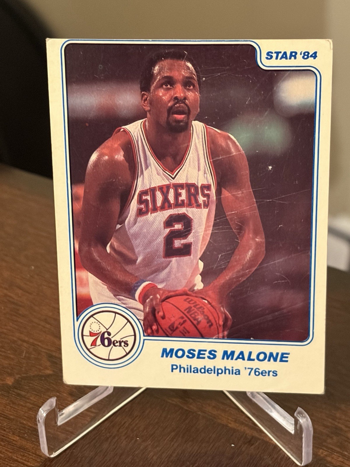1983-84 Star #7 Moses Malone