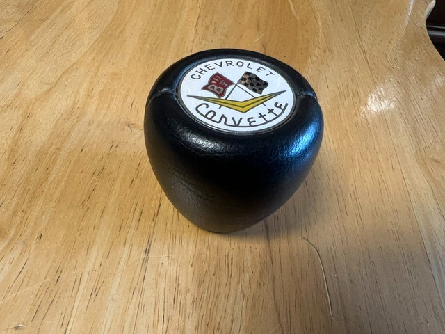 Vintage corvette AMCO leather cross flags shifter knob used Vintage corvette AMCO leather cross flags shifter knob used