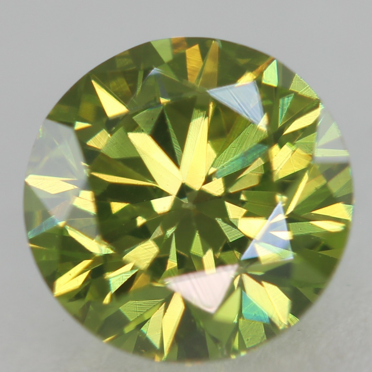 Cert 0.71 Carat Vivid Green VVS1 Round Brilliant Natural Enhanced Diamond 5.64mm