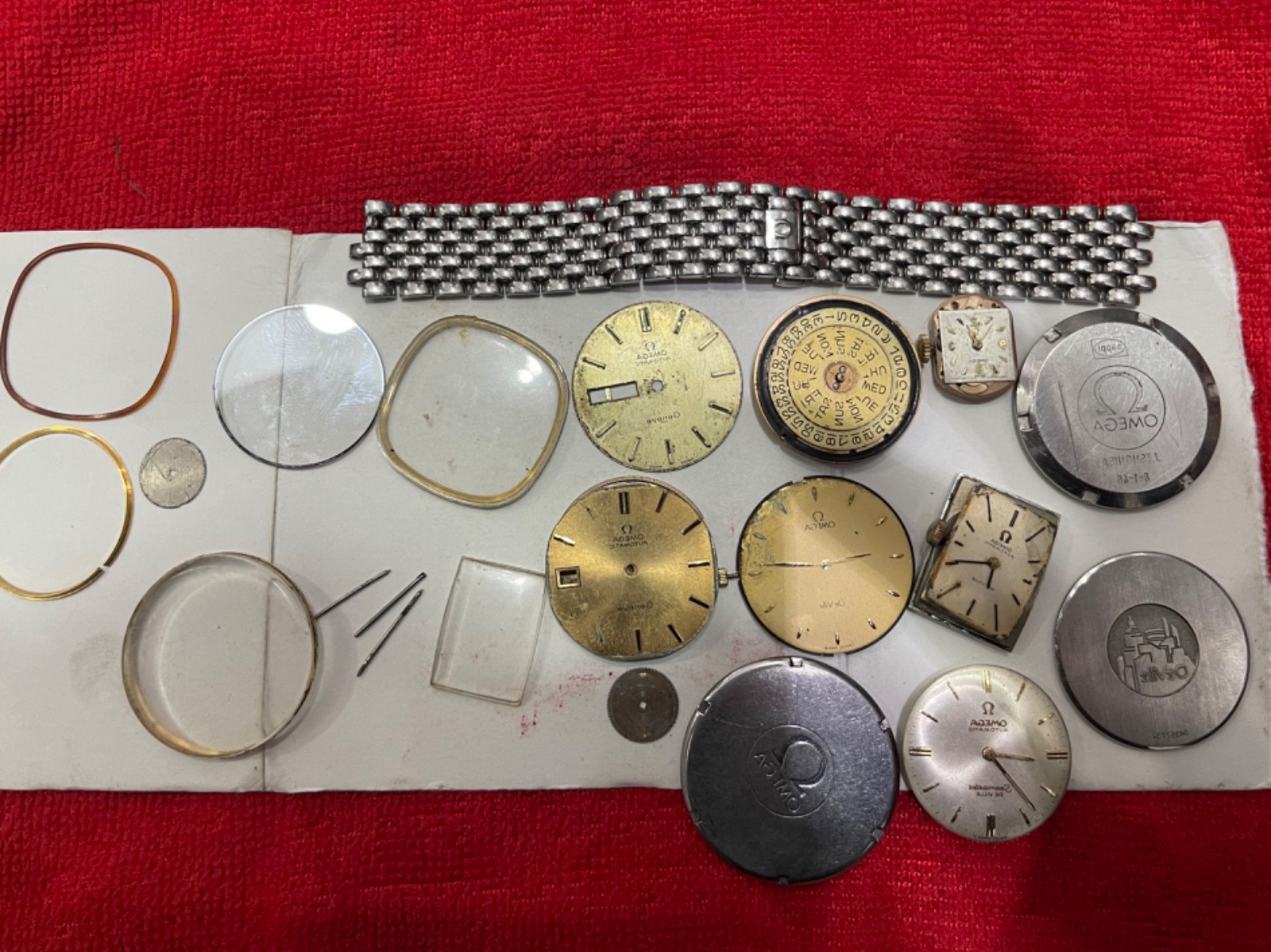 Loot of Omega movement Parts Braclet,Glass,Dail E.t.c
