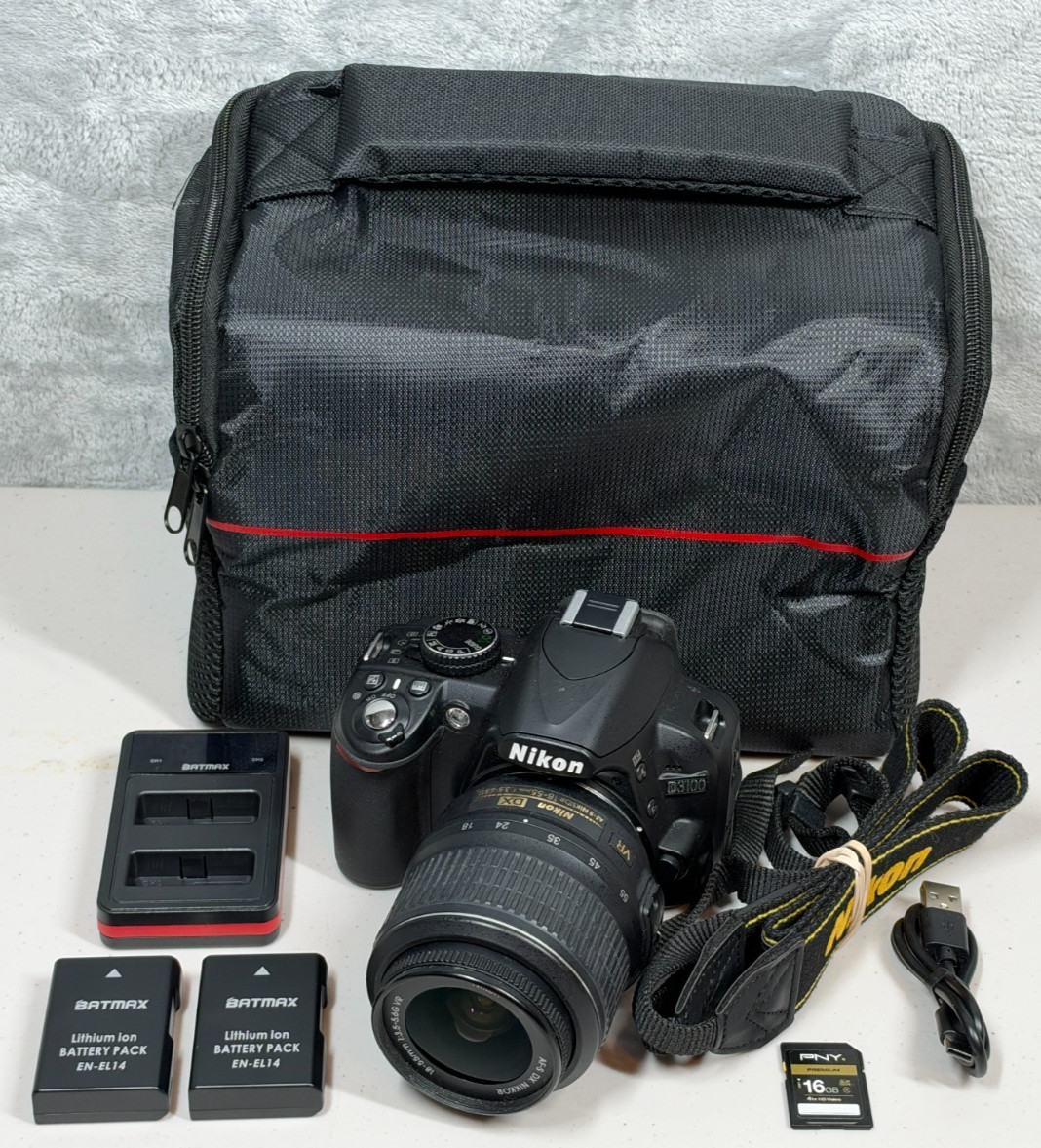 Nikon D3100 DSLR Camera W/ 18-55mm VR Lens - Bundle Kit - Shutter Count 4,276 Nikon D3100 DSLR Camera W/ 18-55mm VR Lens - Bundle Kit - Shutter Count 4,276