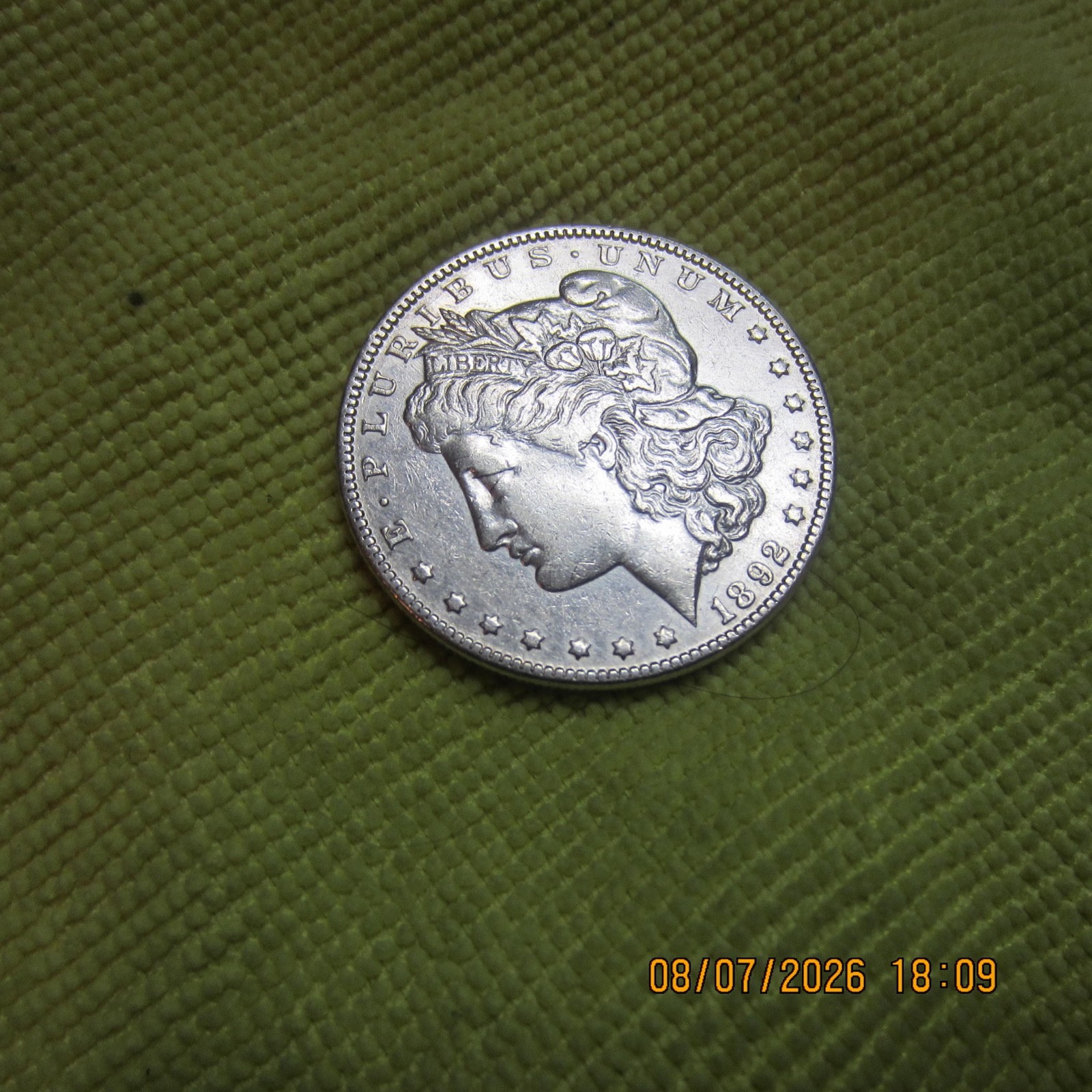 1892 P SILVER MORGAN DOLLAR XFINE TO AU.