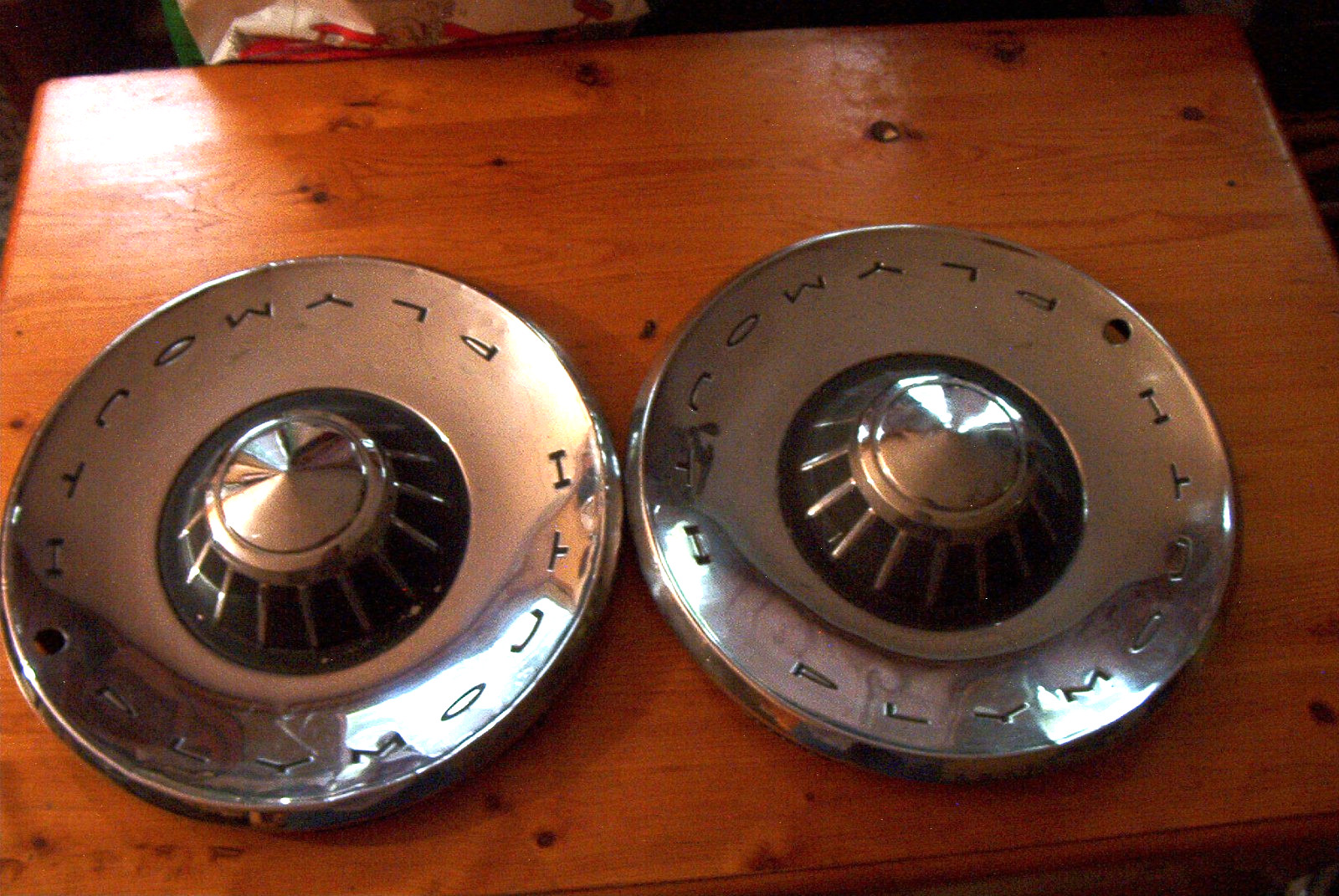 OE vintage pair 62 Plymouth 14 inch wheelcovers, respectable fior daily driver