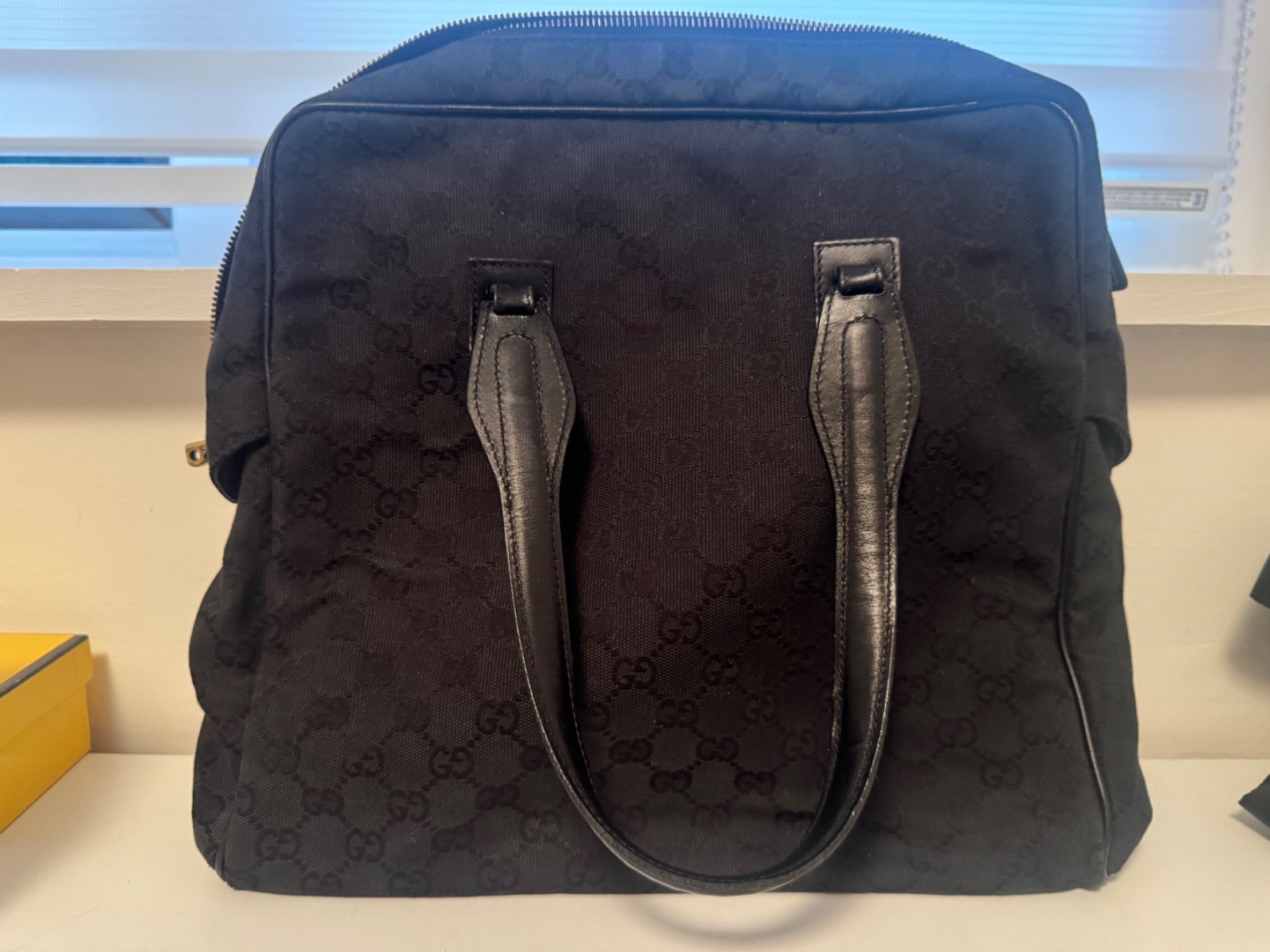 Authentic Gucci black GG monogram canvas and leather trim tote bag Authentic Gucci black GG monogram canvas and leather trim tote bag