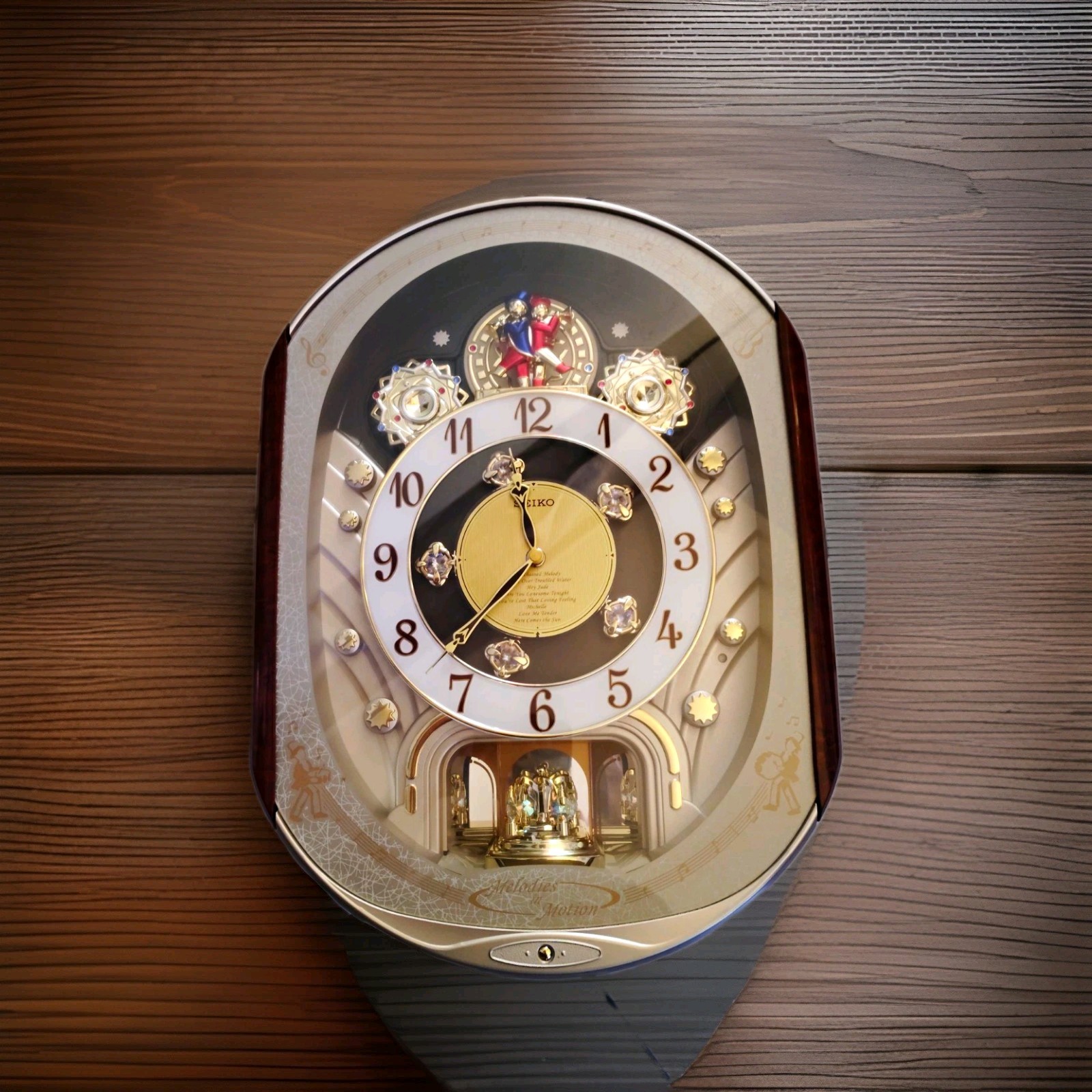 Seiko Melodies in Motion Musical Animated Analog Quartz Oval Wall Clock Gold