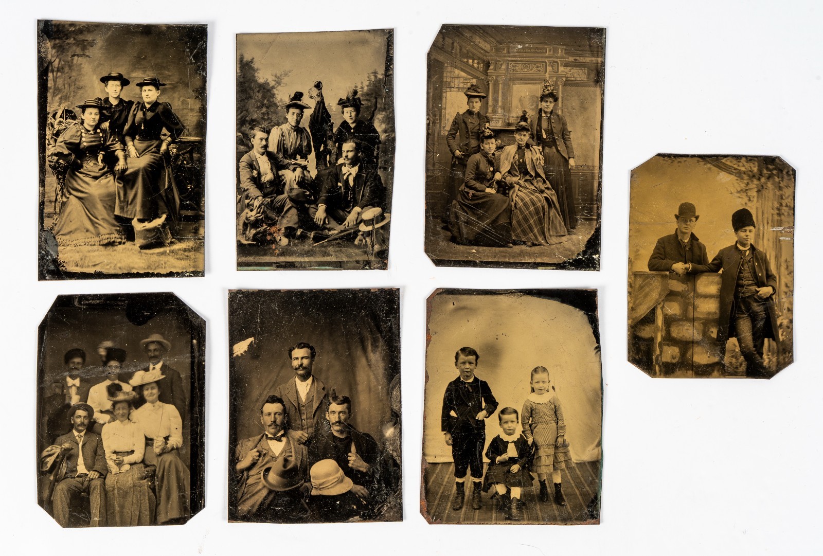 Group of 7 Antique Victorian Tintype Group/Family Portrait Photographs Group of 7 Antique Victorian Tintype Group/Family Portrait Photographs