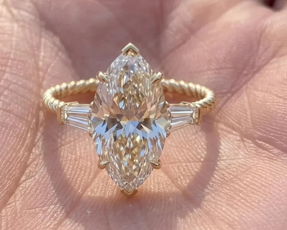 3Ct Marquise Cut VVS1 Moissanite Three Stone Wedding Ring 14k Yellow Gold Plated 3Ct Marquise Cut VVS1 Moissanite Three Stone Wedding Ring 14k Yellow Gold Plated