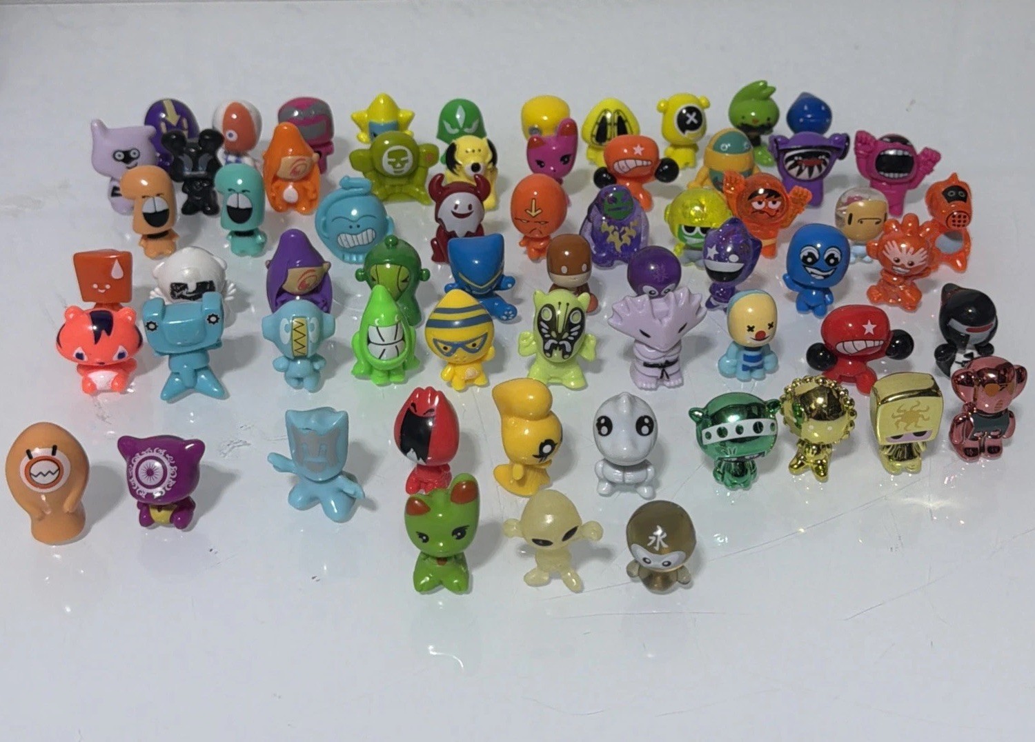 Gogo’s Crazy Bones Lot of 63 Figures Mixed Series Metallic Glitter Variants