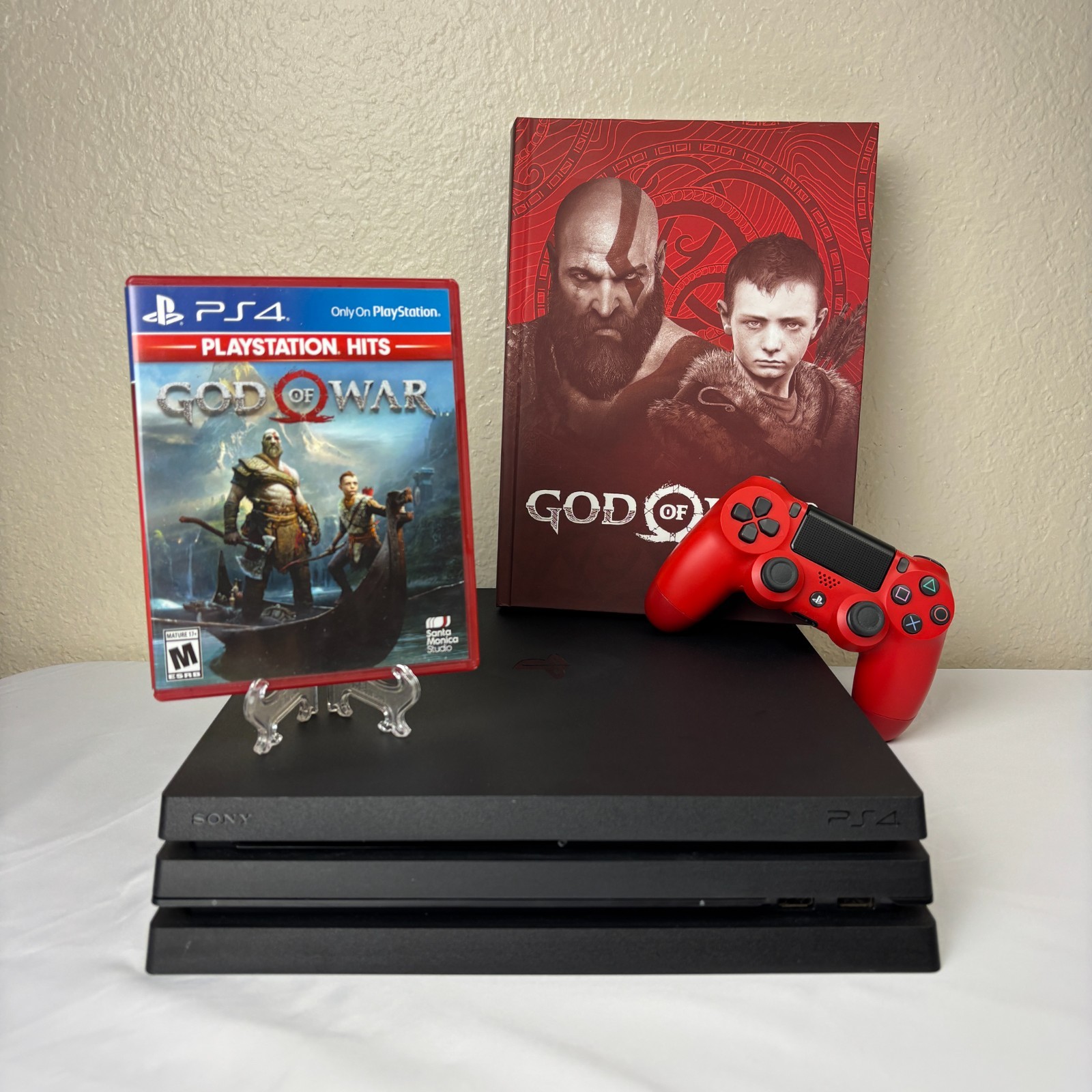 Sony PS4 Pro 1TB Console Bundle - Controller & Charger God of War Guide and Game Sony PS4 Pro 1TB Console Bundle - Controller & Charger God of War Guide and Game