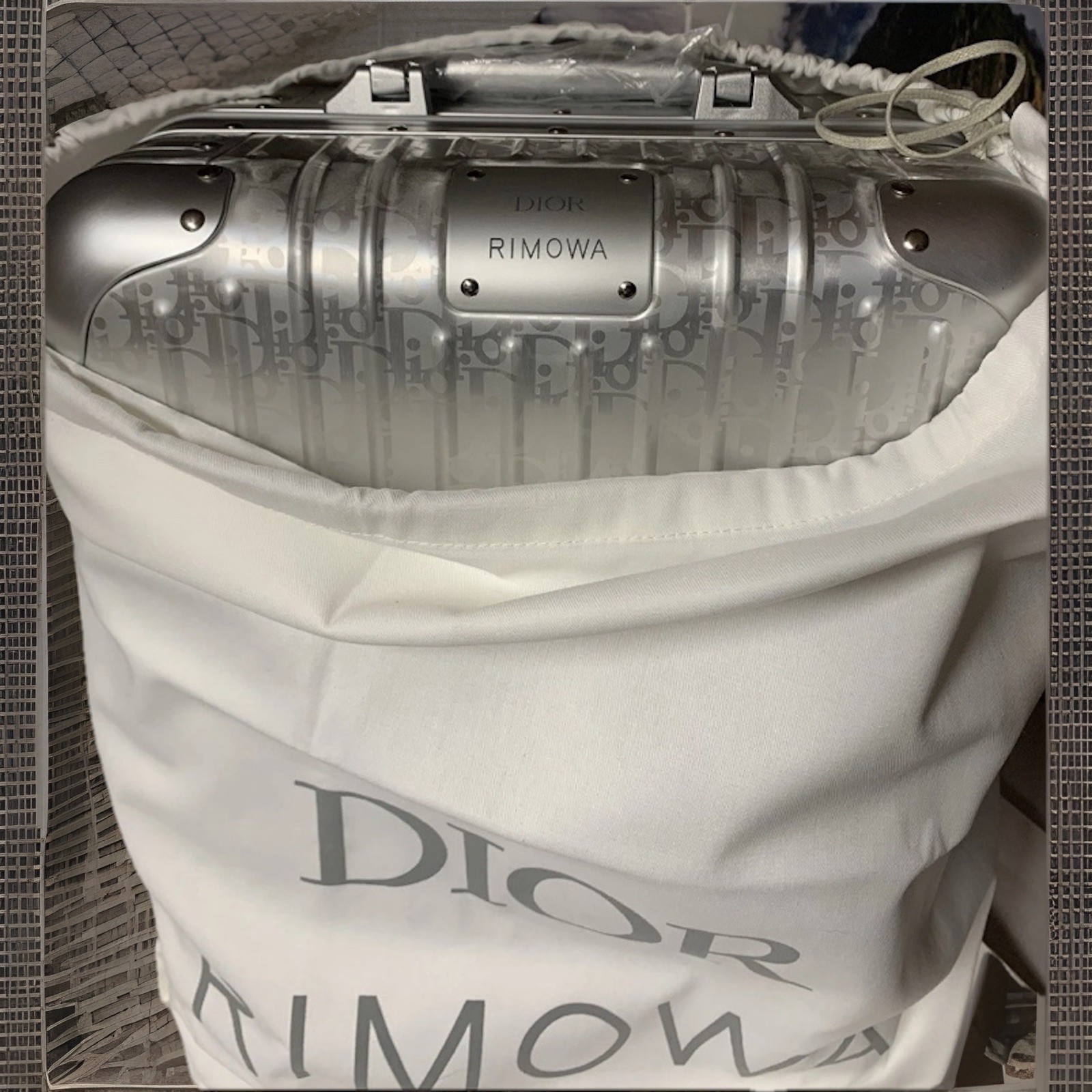NEW-limited Edition Dior X Rimowa Silver 21” Aluminum Oblique Carry On.