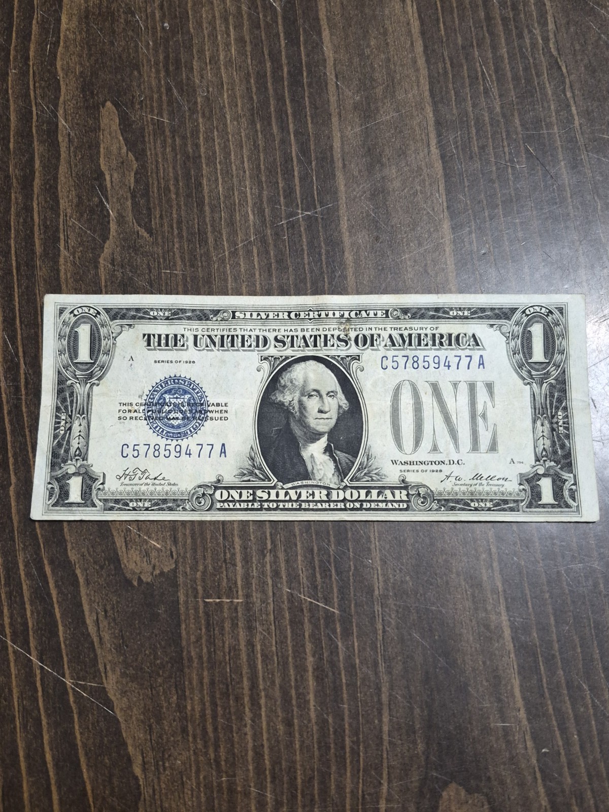 1928A $1, silver certificate. Circulate With folds and stains. 1928A $1, silver certificate. Circulate With folds and stains.