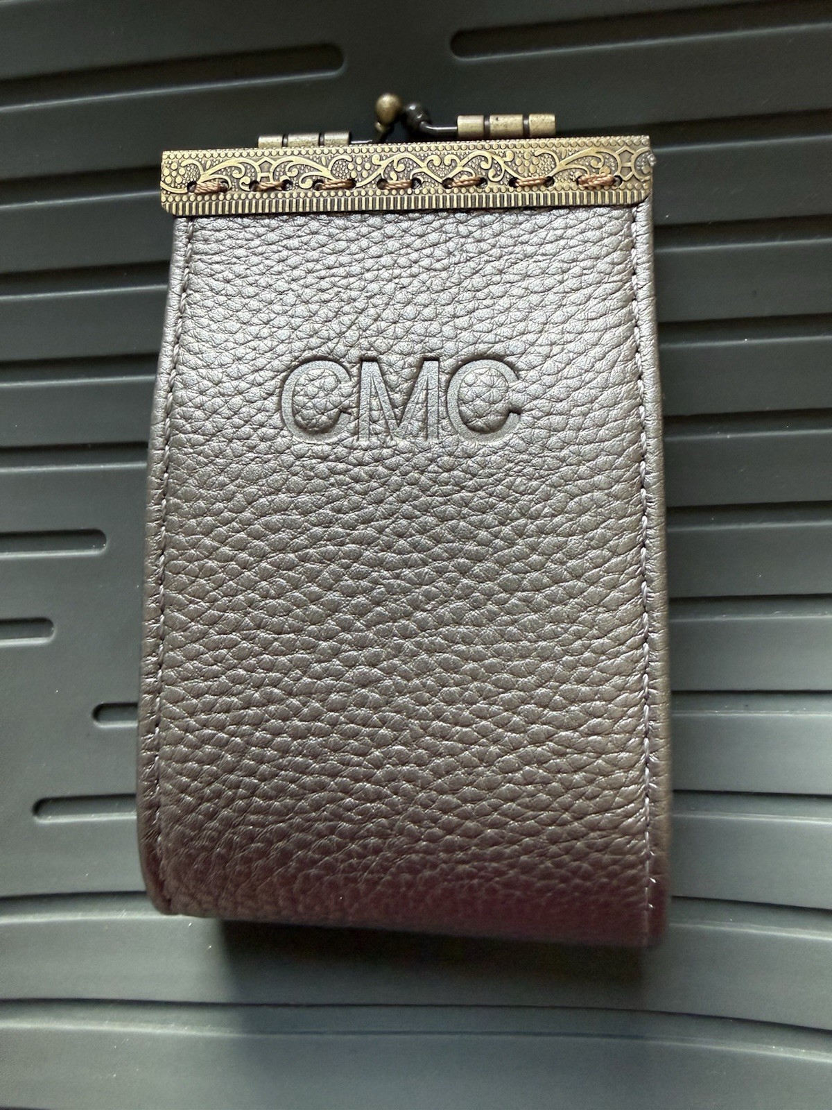 Handmade kiss-lock coin purse marked “MCW handmade.” Handmade kiss-lock coin purse marked “MCW handmade.”
