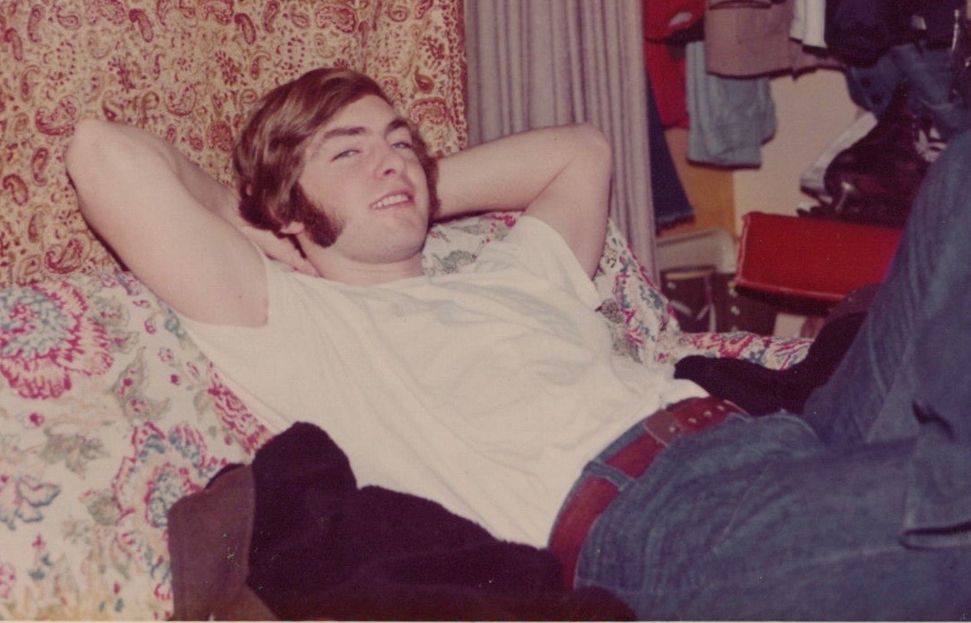1980s Handsome Man Relaxing Bed Smiling Portrait Bedroom Sideburns