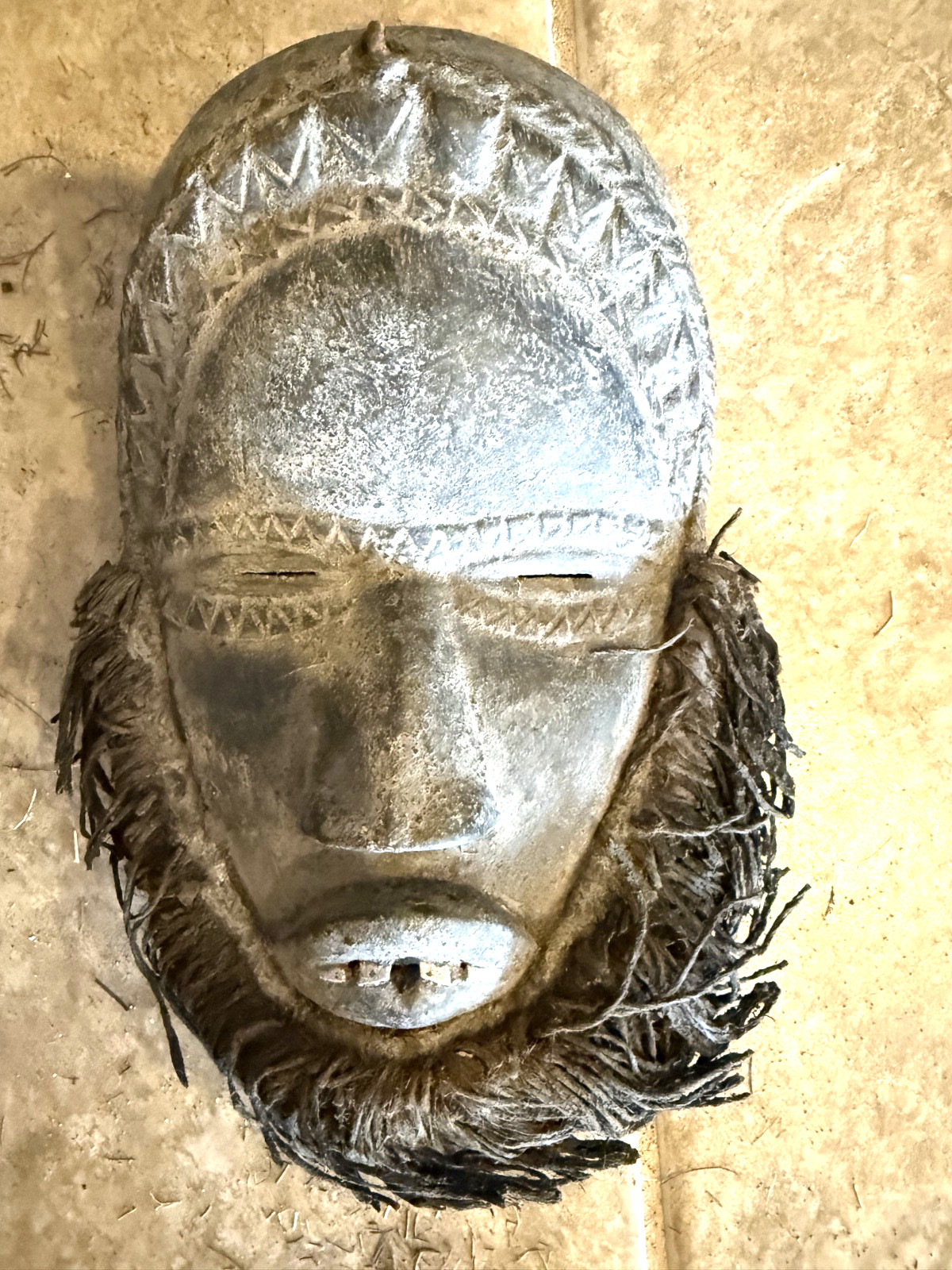 Small West or Central African wooden face mask, probably Dan/Kran-influenced.