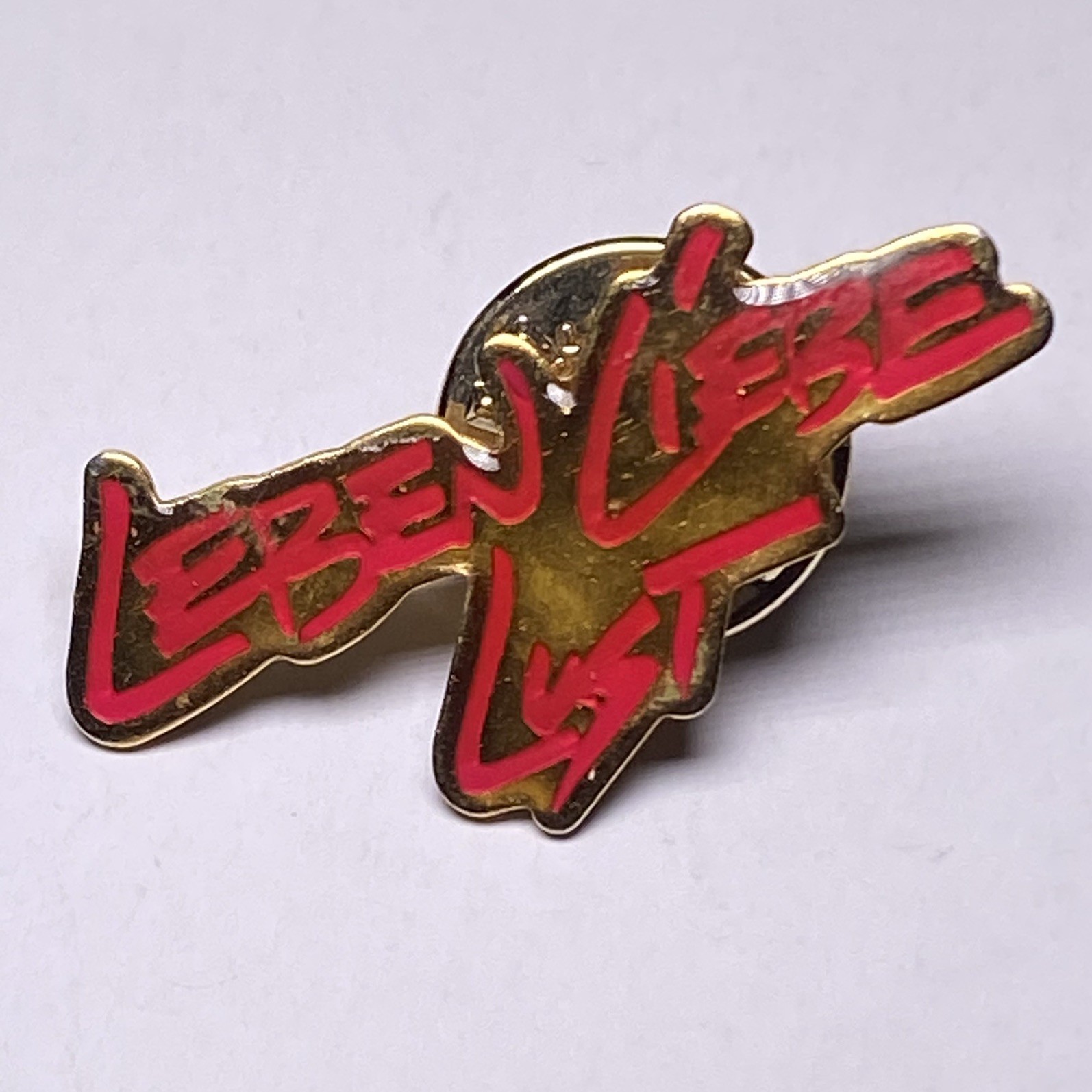 Vintage Leben Liebe Lust German Enamel Lapel Pin Badge Red Gold Tone Vintage Leben Liebe Lust German Enamel Lapel Pin Badge Red Gold Tone