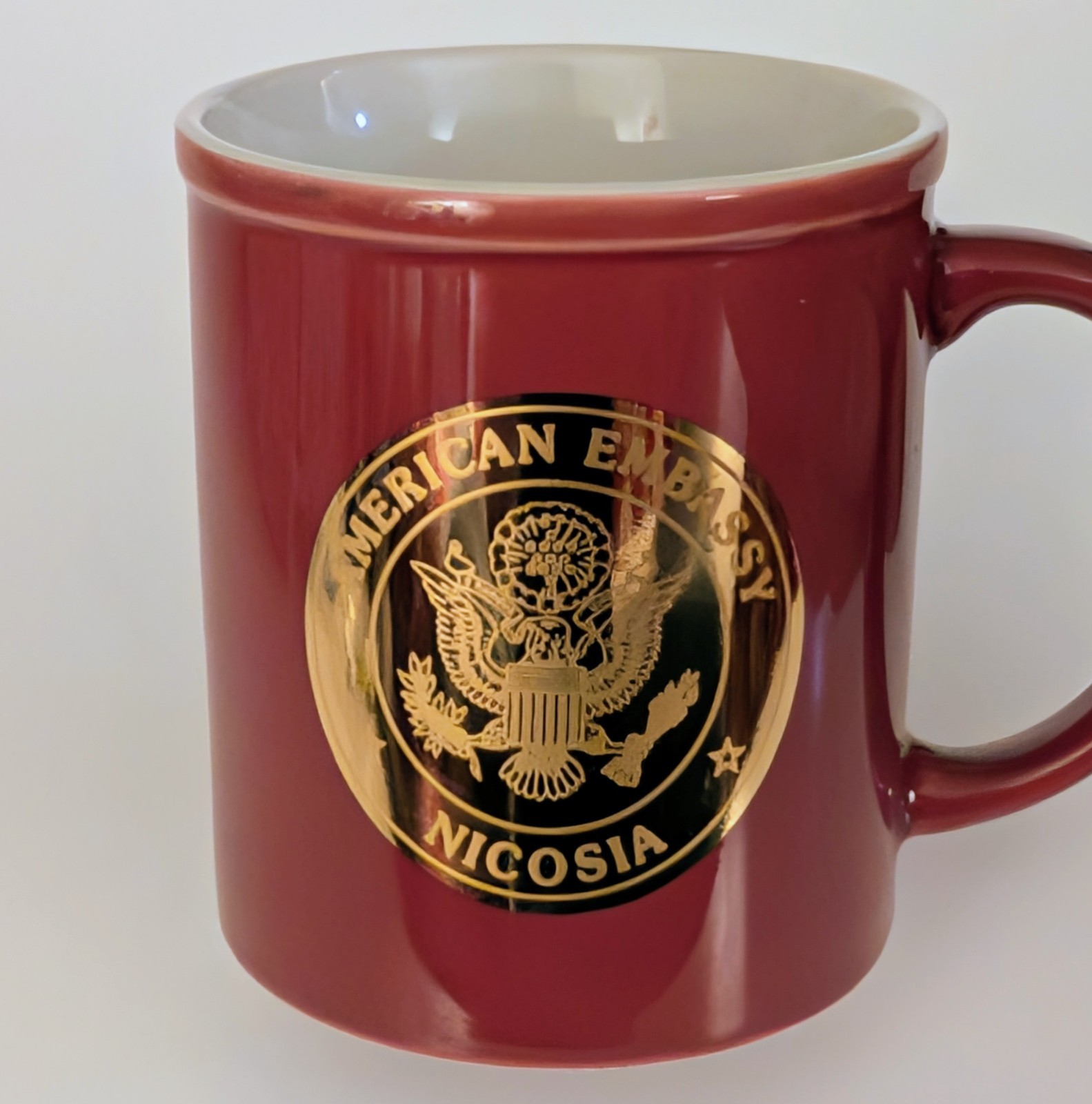 Nicosa America Embassy Ceramic Coffee Mug Maroon Red Gold Seal Trim Excellent