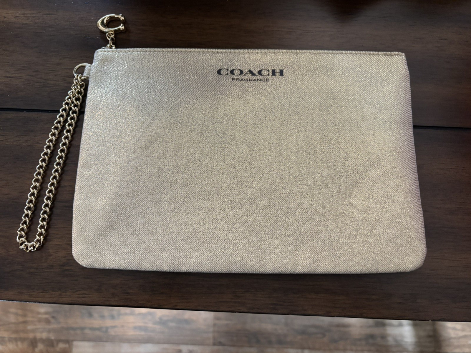 Coach gold Zipper Makeup Bag or wristlet Coach gold Zipper Makeup Bag or wristlet