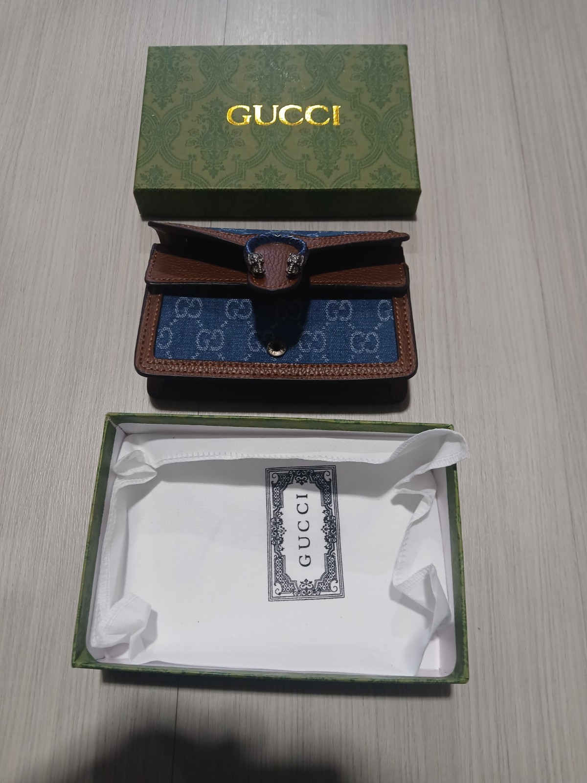 Gucci Women’s Blue/Brown GG Pattern Wallet with Logo Accents
