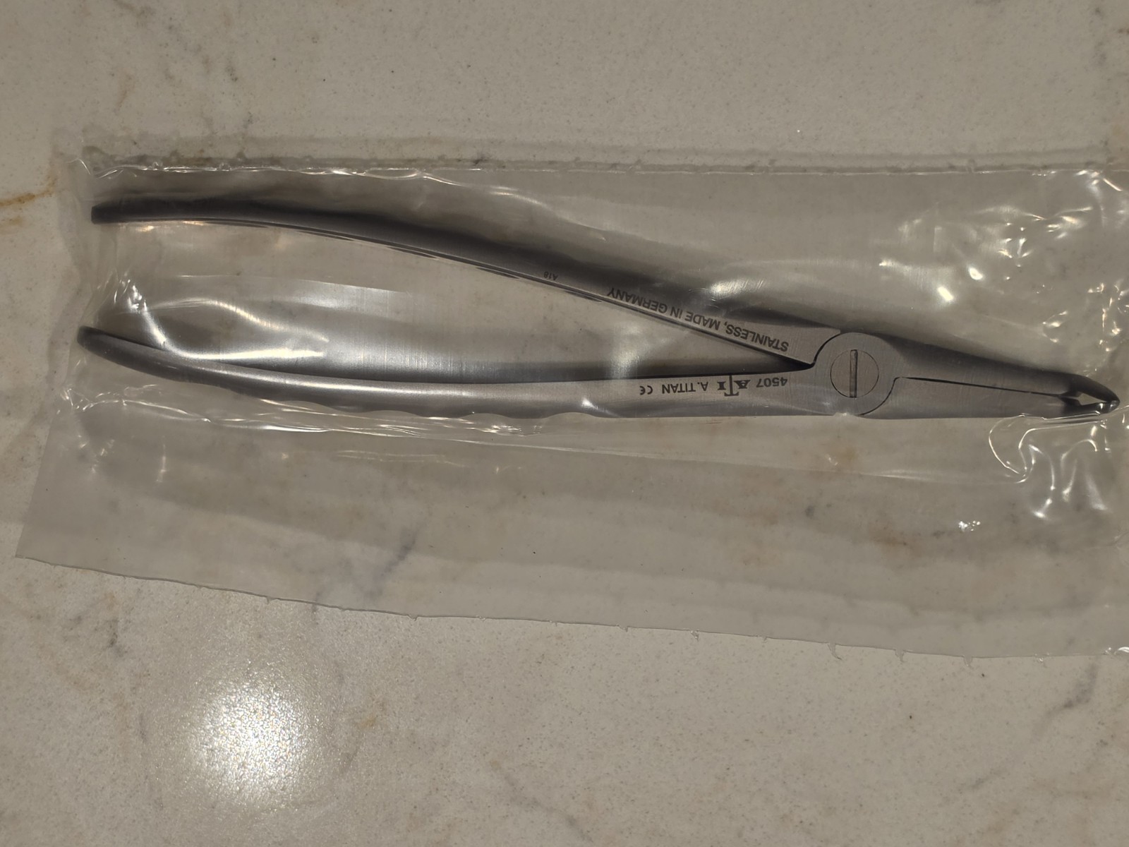 A. Titan X-Trac Extracting Forceps Lower Narrow Root Fragment 4507