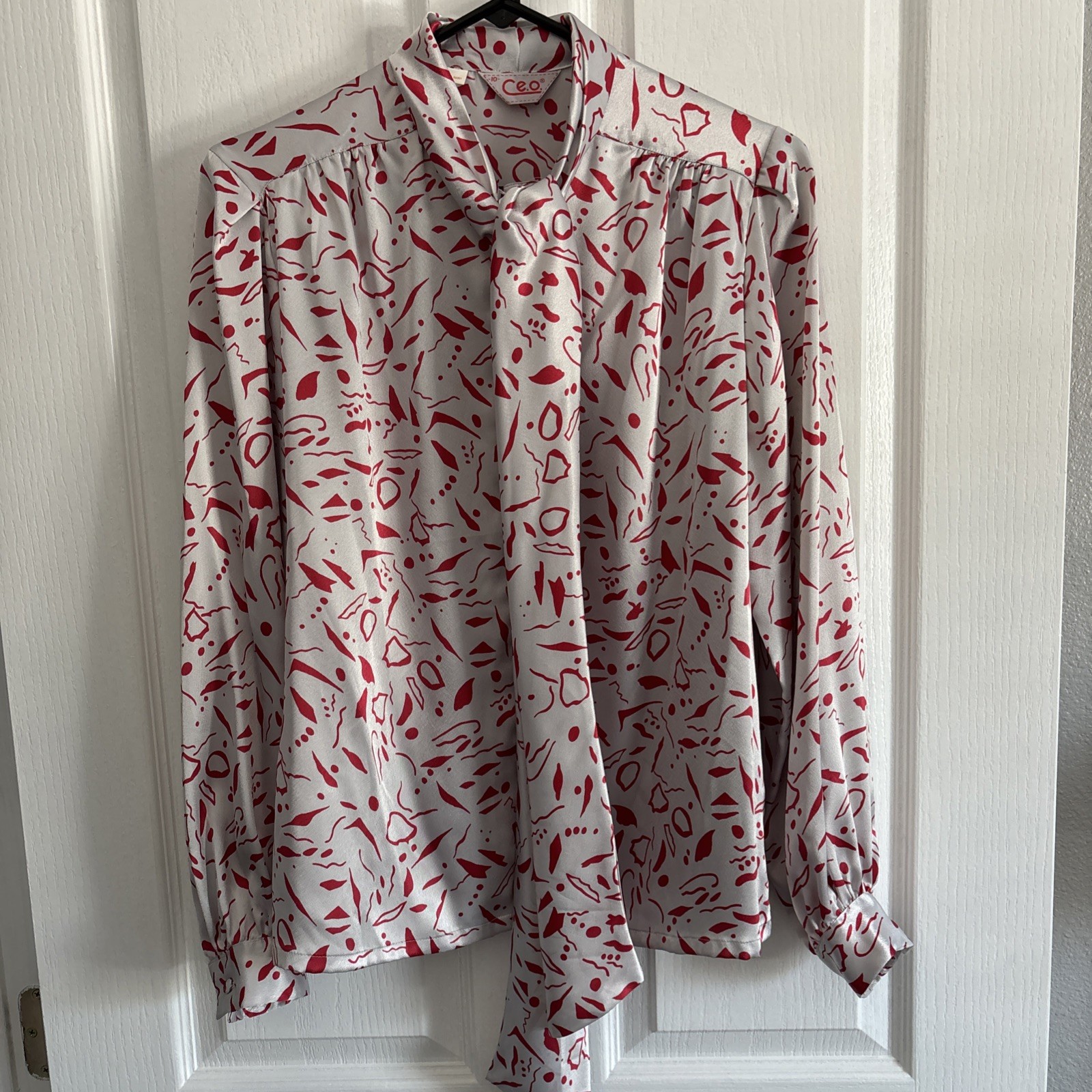 VTG. C.E.O. IVORY 100% POLYESTER BUTTON-DOWN SHEER LONG SLEEVE BLOUSE SIZE 10 VTG. C.E.O. IVORY 100% POLYESTER BUTTON-DOWN SHEER LONG SLEEVE BLOUSE SIZE 10