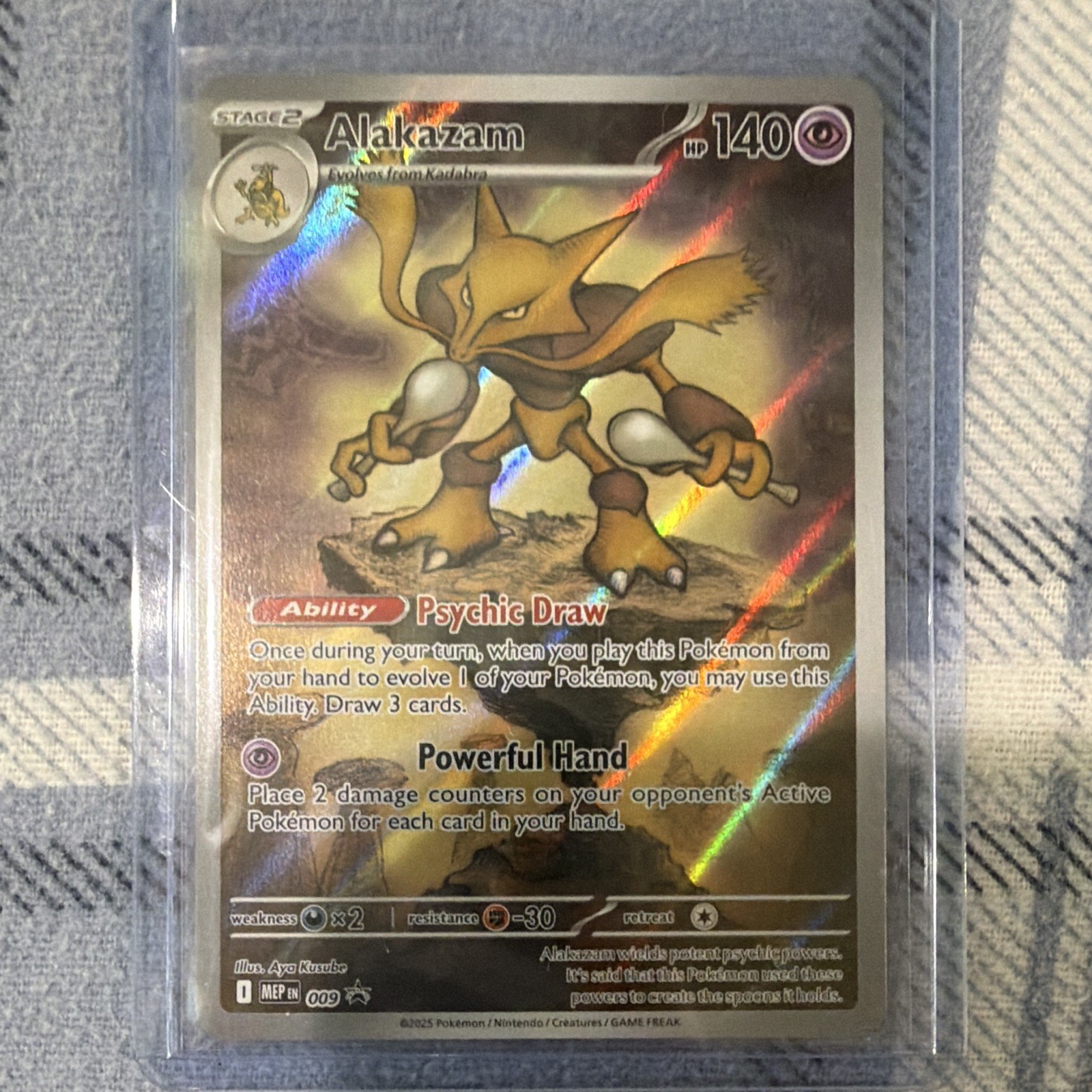 Alakazam 009 Me: Mega Evolution Promo Holo (Little White On The Top Of The Back) Alakazam 009 Me: Mega Evolution Promo Holo (Little White On The Top Of The Back)