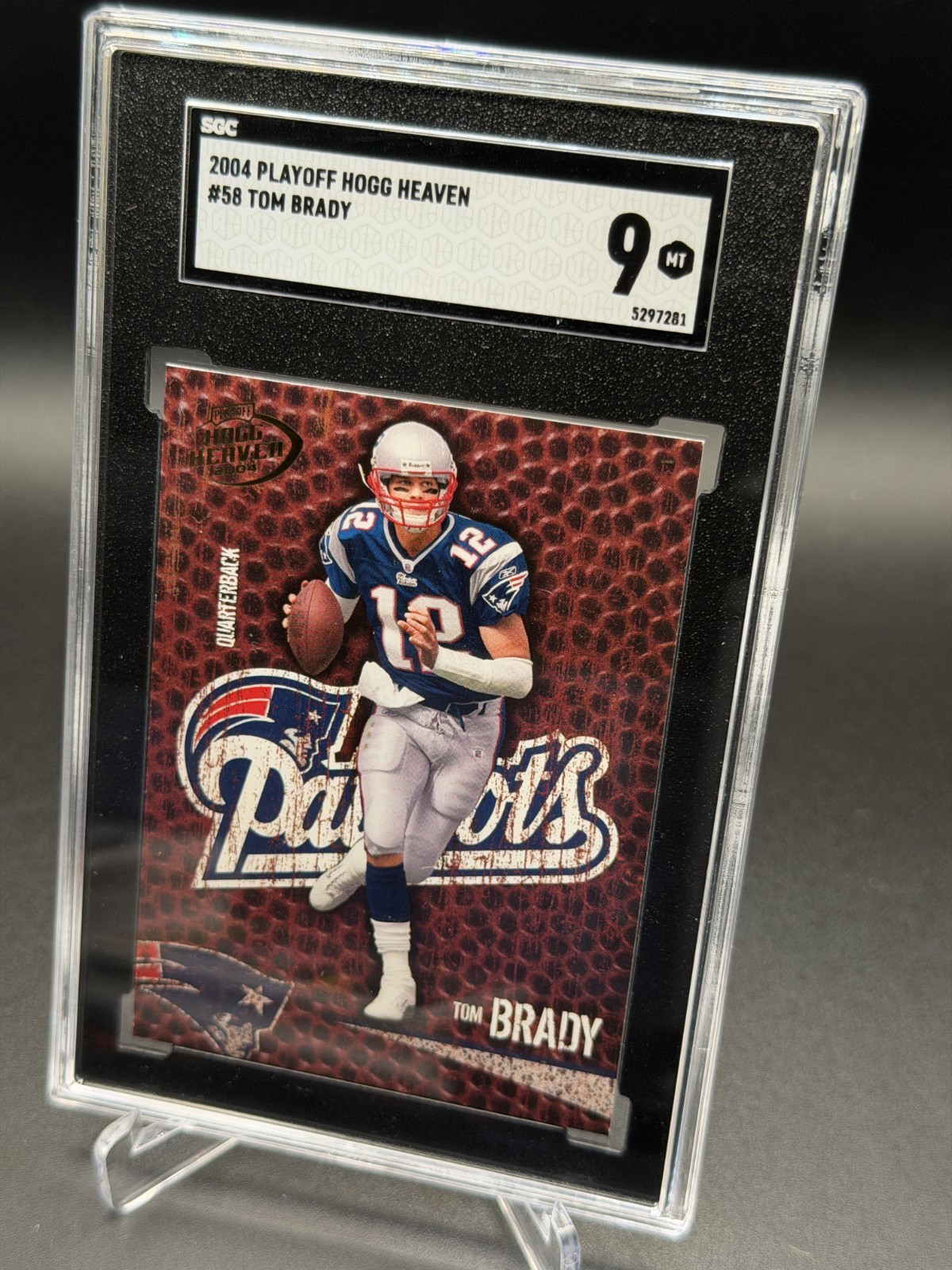 2004 Playoff Football #58 Tom Brady New England Patriots Hogg Heaven SGC 9 Mint 2004 Playoff Football #58 Tom Brady New England Patriots Hogg Heaven SGC 9 Mint