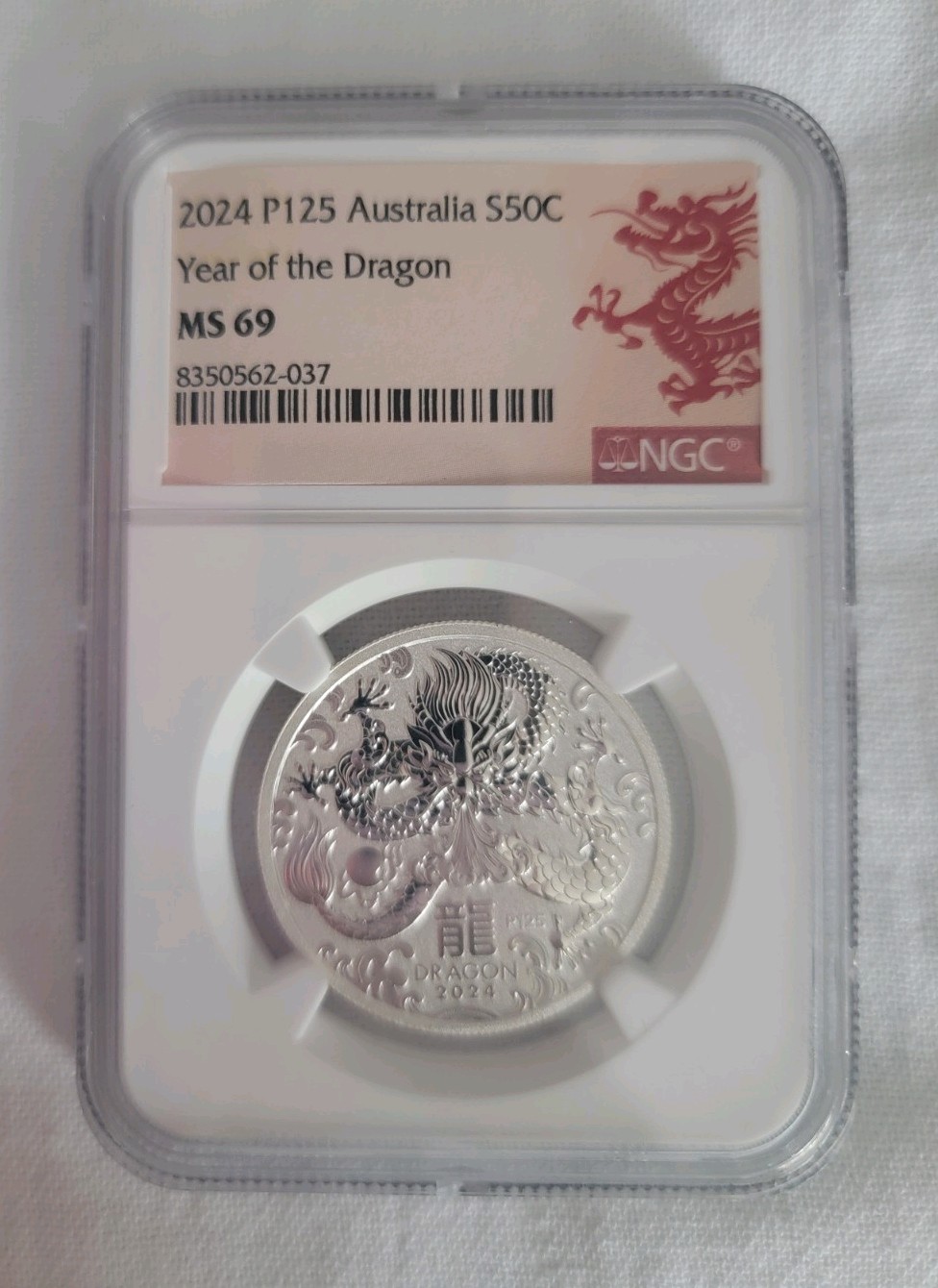 2024 P125 Australia S50C Year of the Dragon MS 69 NGC New Scratch Free holder. 2024 P125 Australia S50C Year of the Dragon MS 69 NGC New Scratch Free holder.