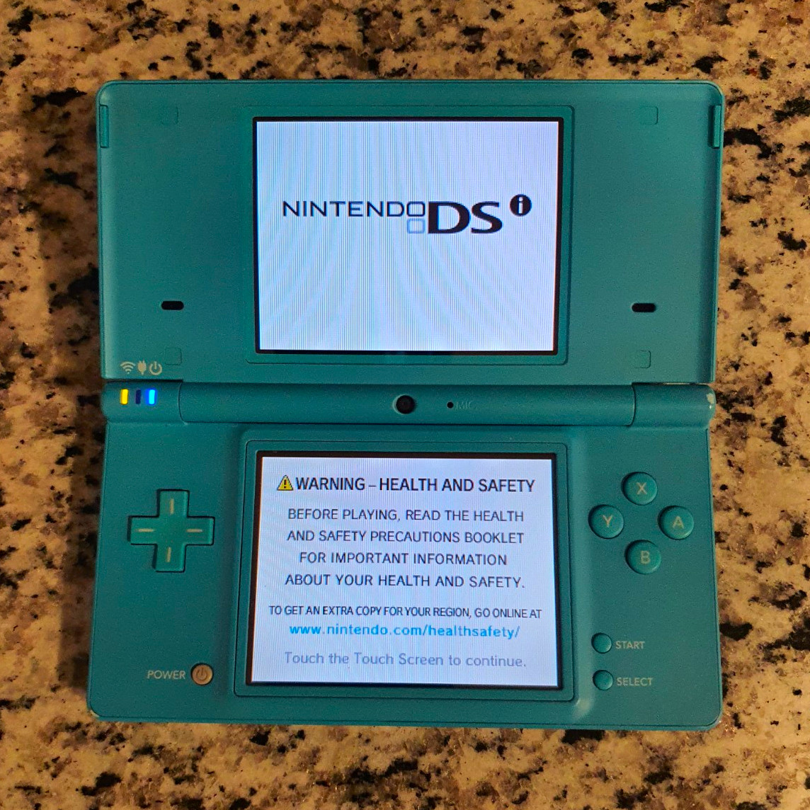 Nintendo DSi Blue Teal TWL-001 NTSC-U/C 256MB Wi-Fi Handheld System Nintendo DSi Blue Teal TWL-001 NTSC-U/C 256MB Wi-Fi Handheld System