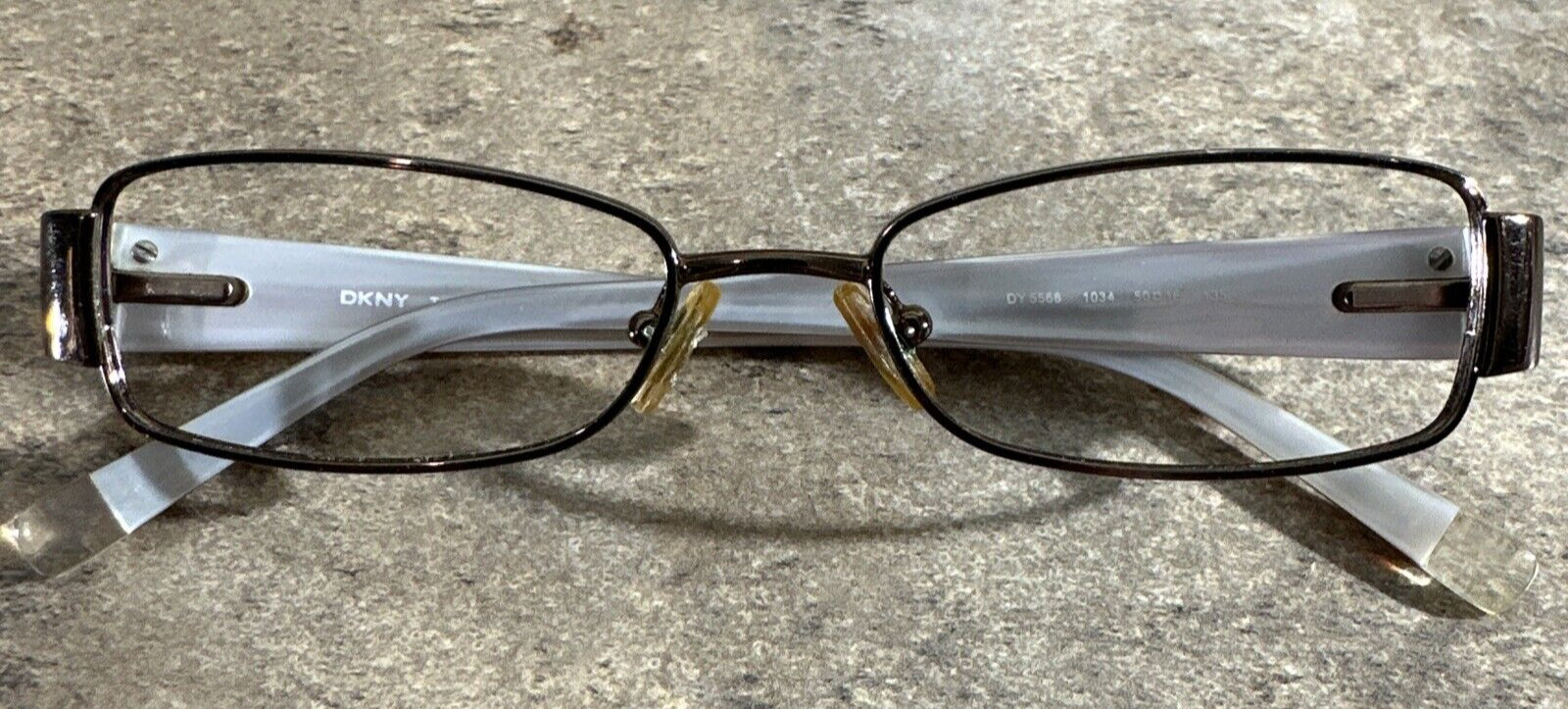 DKNY Dy 5566 1034 Brown Eyeglasses Frames Full Rim 50-16-135-25mm G17 DKNY Dy 5566 1034 Brown Eyeglasses Frames Full Rim 50-16-135-25mm G17
