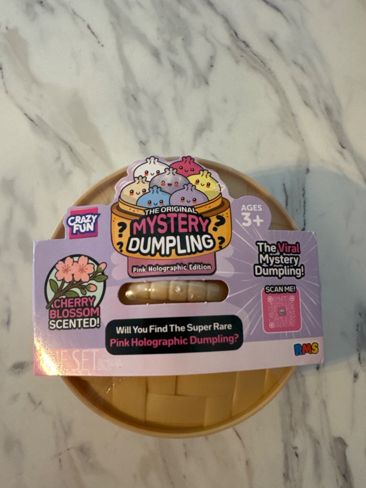 Viral RMS Mystery Dumpling Pink Holographic Cherry Blossom Scented Squishy Viral RMS Mystery Dumpling Pink Holographic Cherry Blossom Scented Squishy