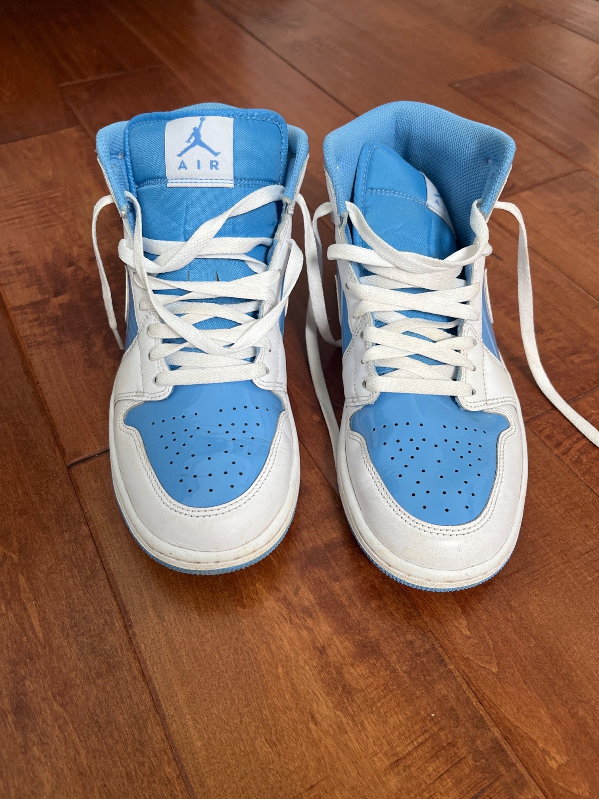 Light blue boys Air Jordan tennis shoes size 8.5, barely worn.