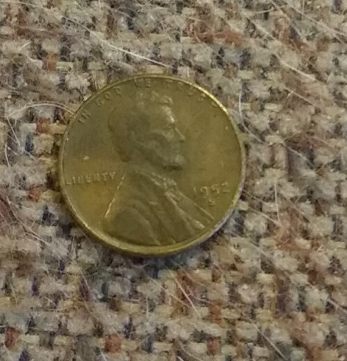 1952 S Lincoln Wheat Penny. L on rim. $300.