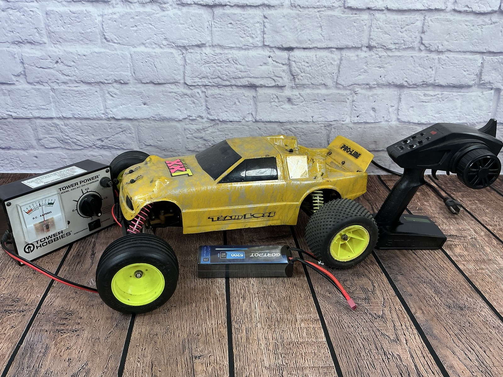 Team Losi XXT RC Stadium Truck Yellow w/ Transmitter Charger LiPo Battery