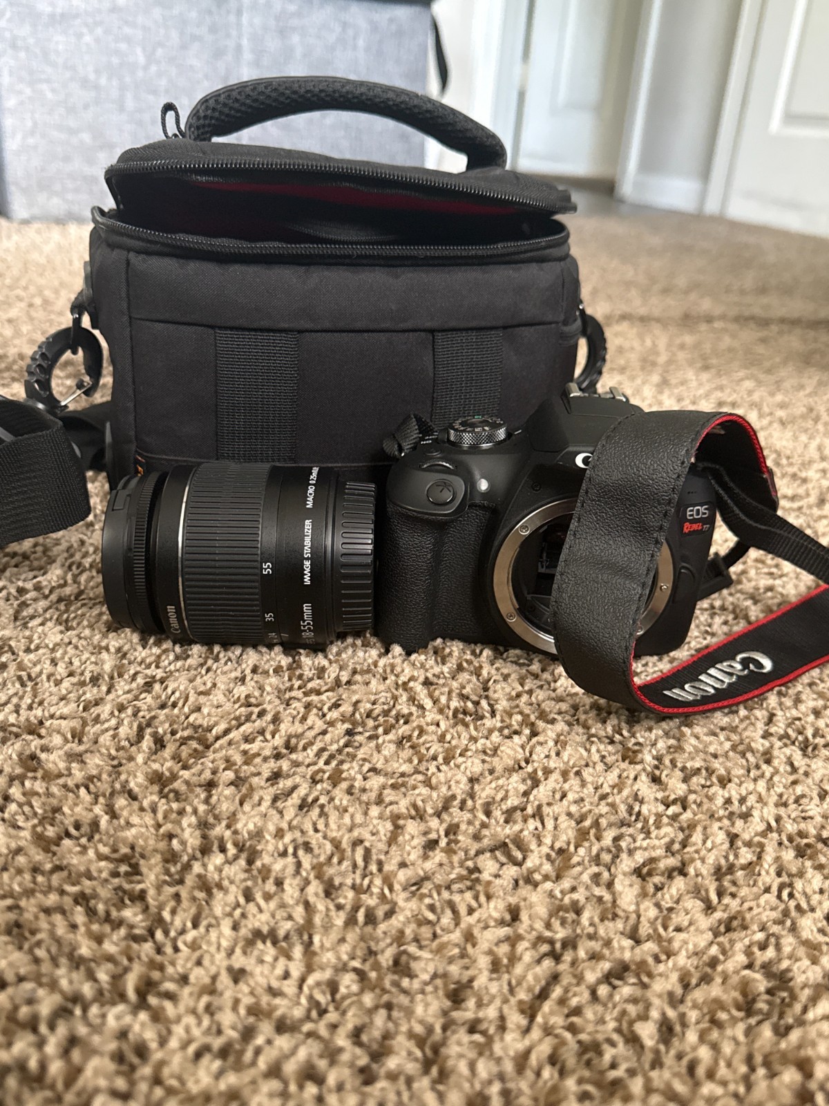 Canon EOS Rebel T7 24.1 MP Digital SLR Camera - Black (Kit with 18-55 Lens) Canon EOS Rebel T7 24.1 MP Digital SLR Camera - Black (Kit with 18-55 Lens)
