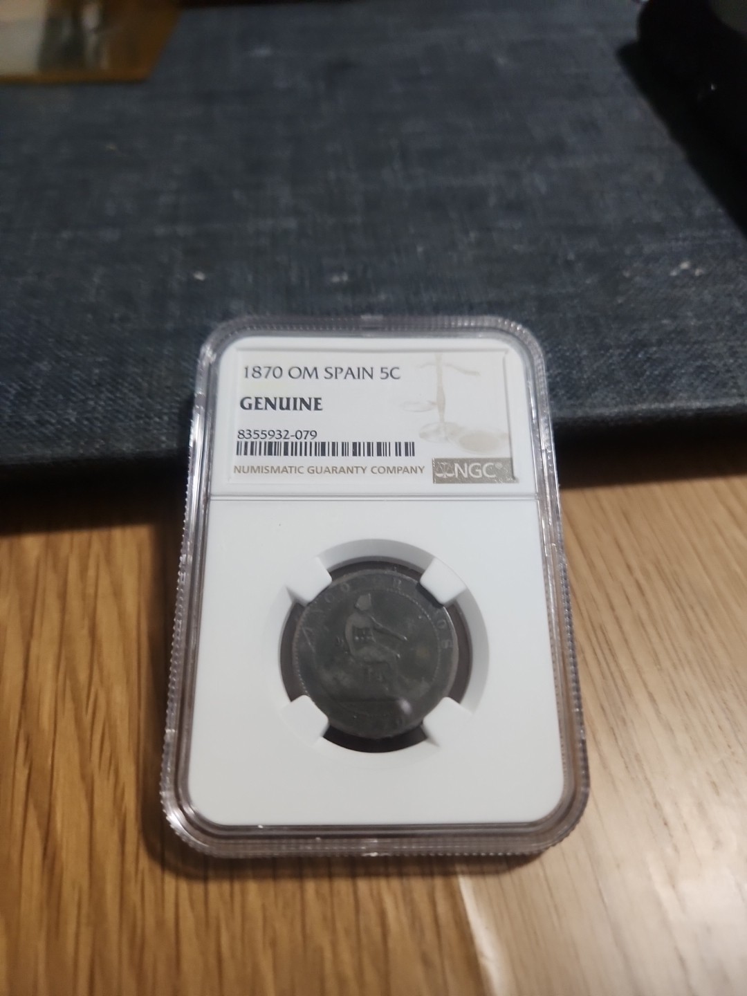 1870 Om Spain 5 C Coin NGC Genuine 1870 Om Spain 5 C Coin NGC Genuine