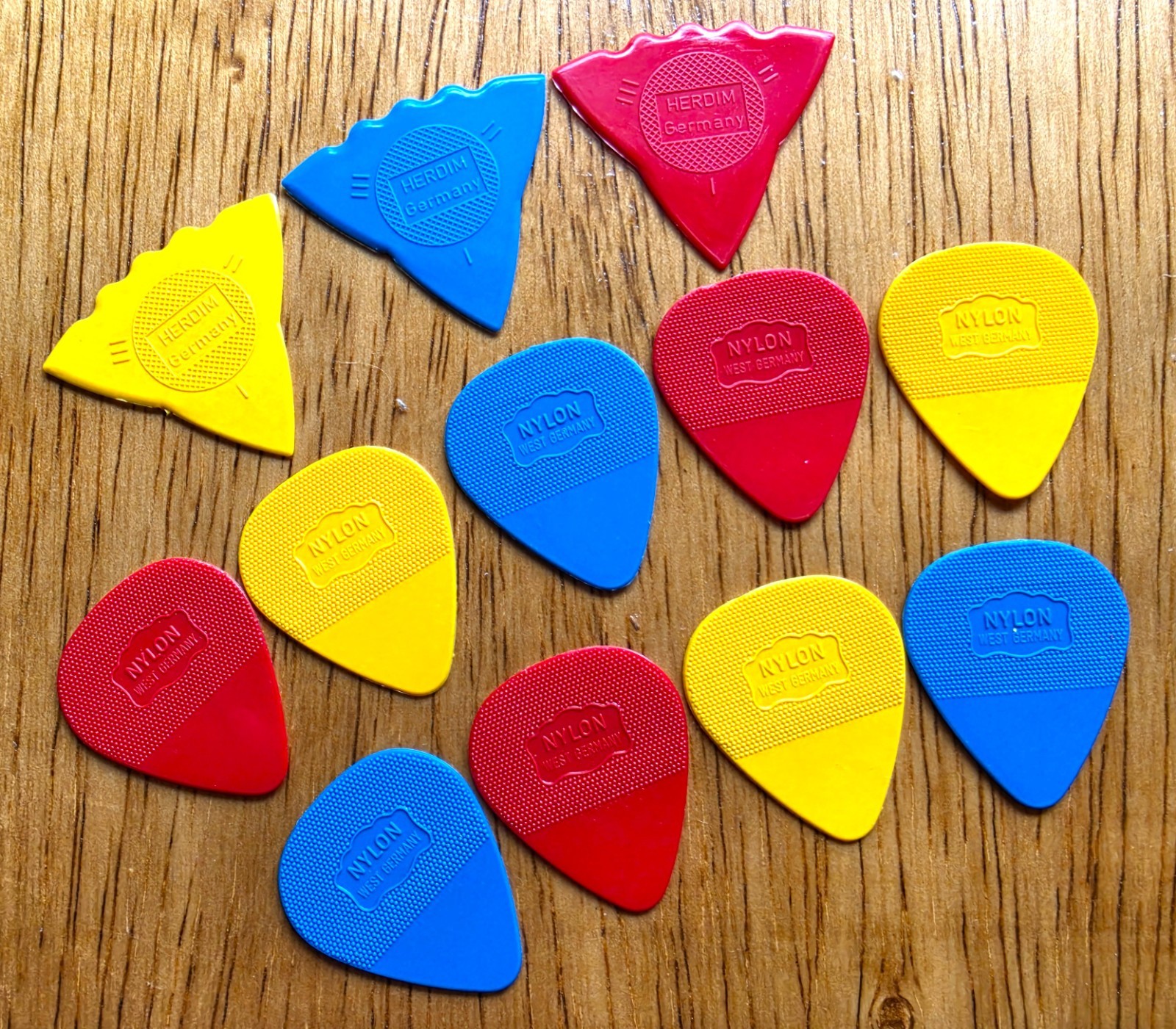 Herdim Triple Sided & tear drop Guitar Pick. Red, Blue,Yellow,Red - 12 Picks Herdim Triple Sided & tear drop Guitar Pick. Red, Blue,Yellow,Red - 12 Picks