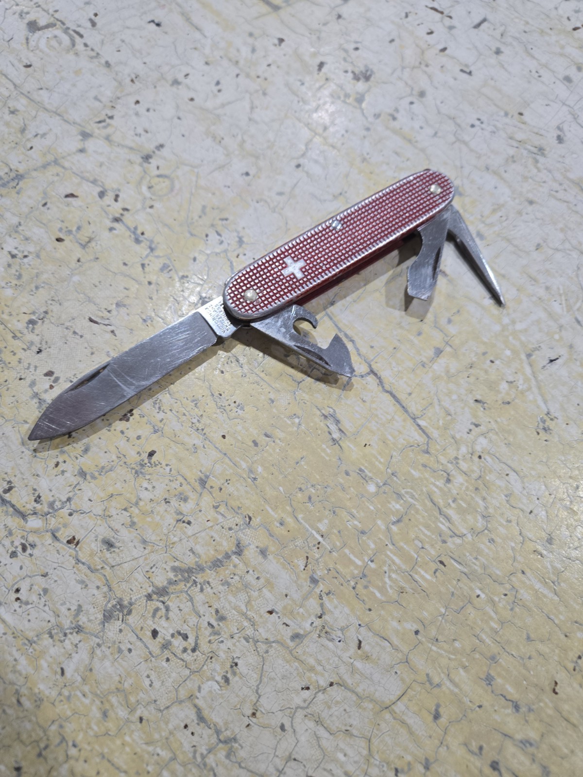 Victorinox Pioneer Alox Swiss Army Knife with red checkered