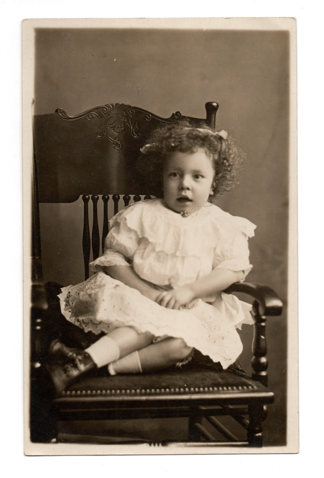 Young Girl w/Curly Hair On Chair Portrait Real Photo Postcard RPPC Unposted