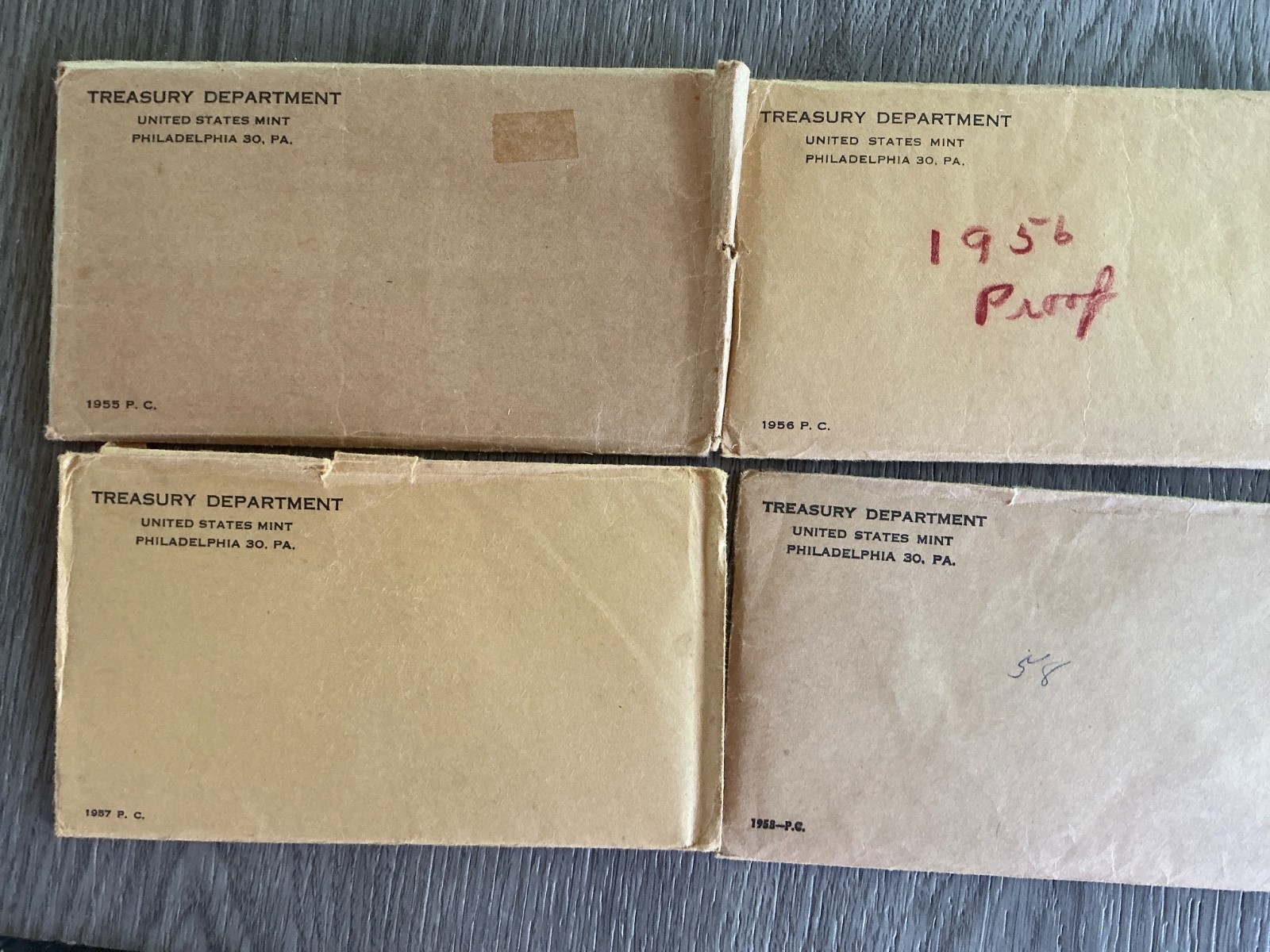 1955 ,1956,1957,1958 4 proof sets.