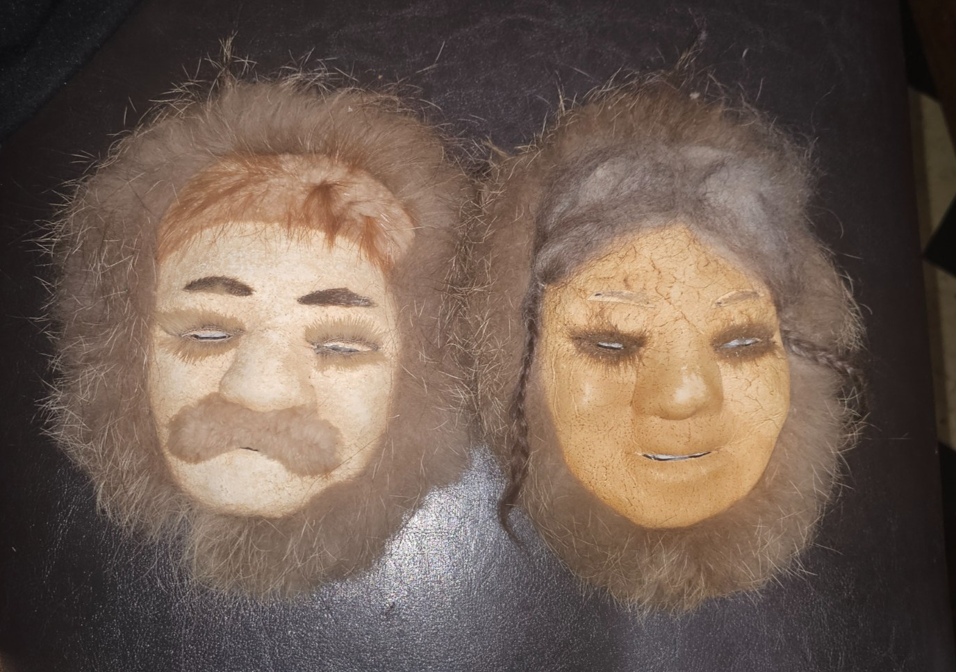 1950\'s Handmade Eskimo masks made out of caribou hide, reindeer and coyote fur