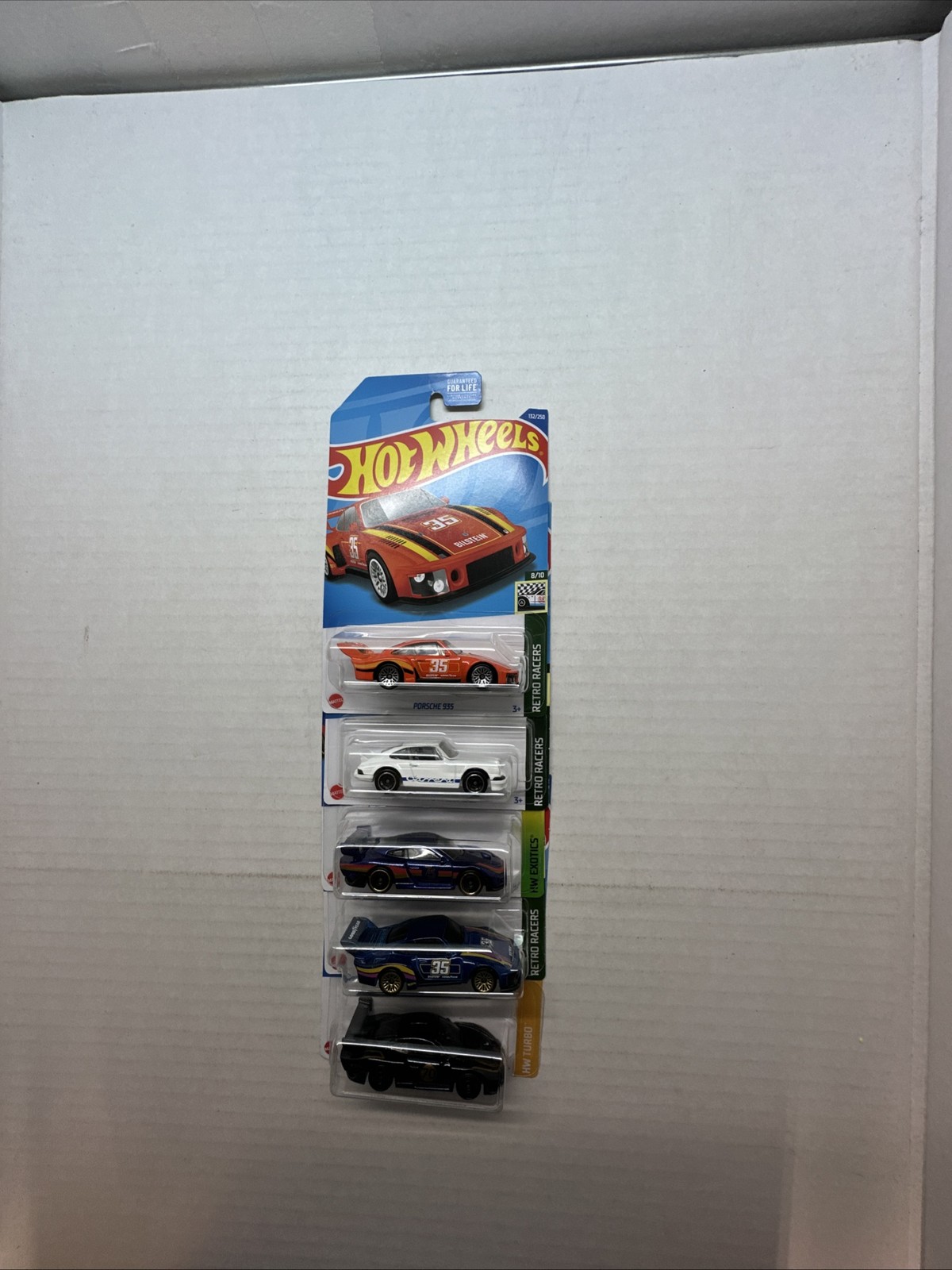 Porsche 935 and 911 Bundle Lot.  Orange Porsche Slight Crease J Hook. On Sale.
