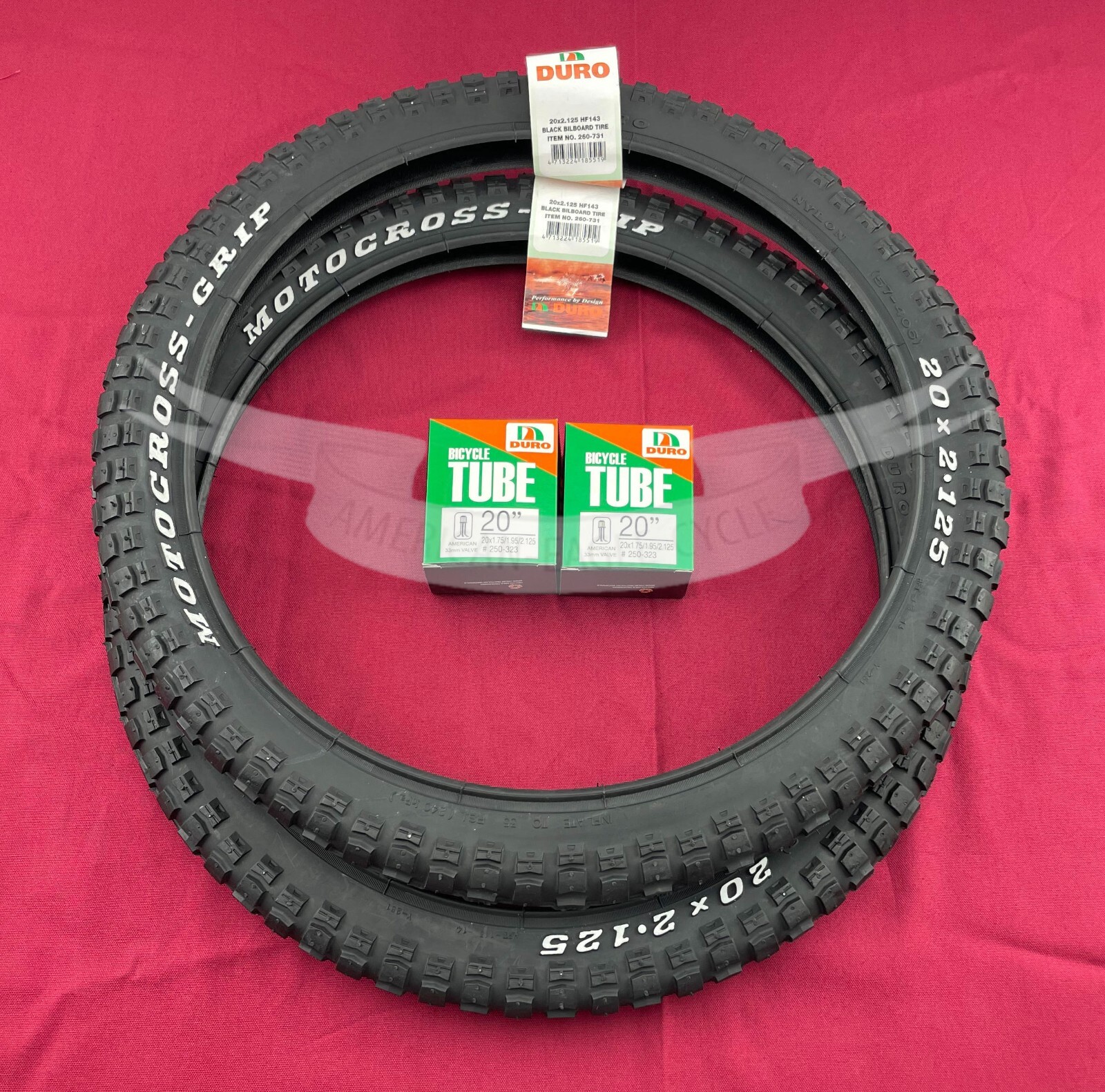 PAIR OF BLACK BICYCLE BMX MOTOCROSS LETTER DURO TIRES W/TUBES IN 20 X 2.125. PAIR OF BLACK BICYCLE BMX MOTOCROSS LETTER DURO TIRES W/TUBES IN 20 X 2.125.