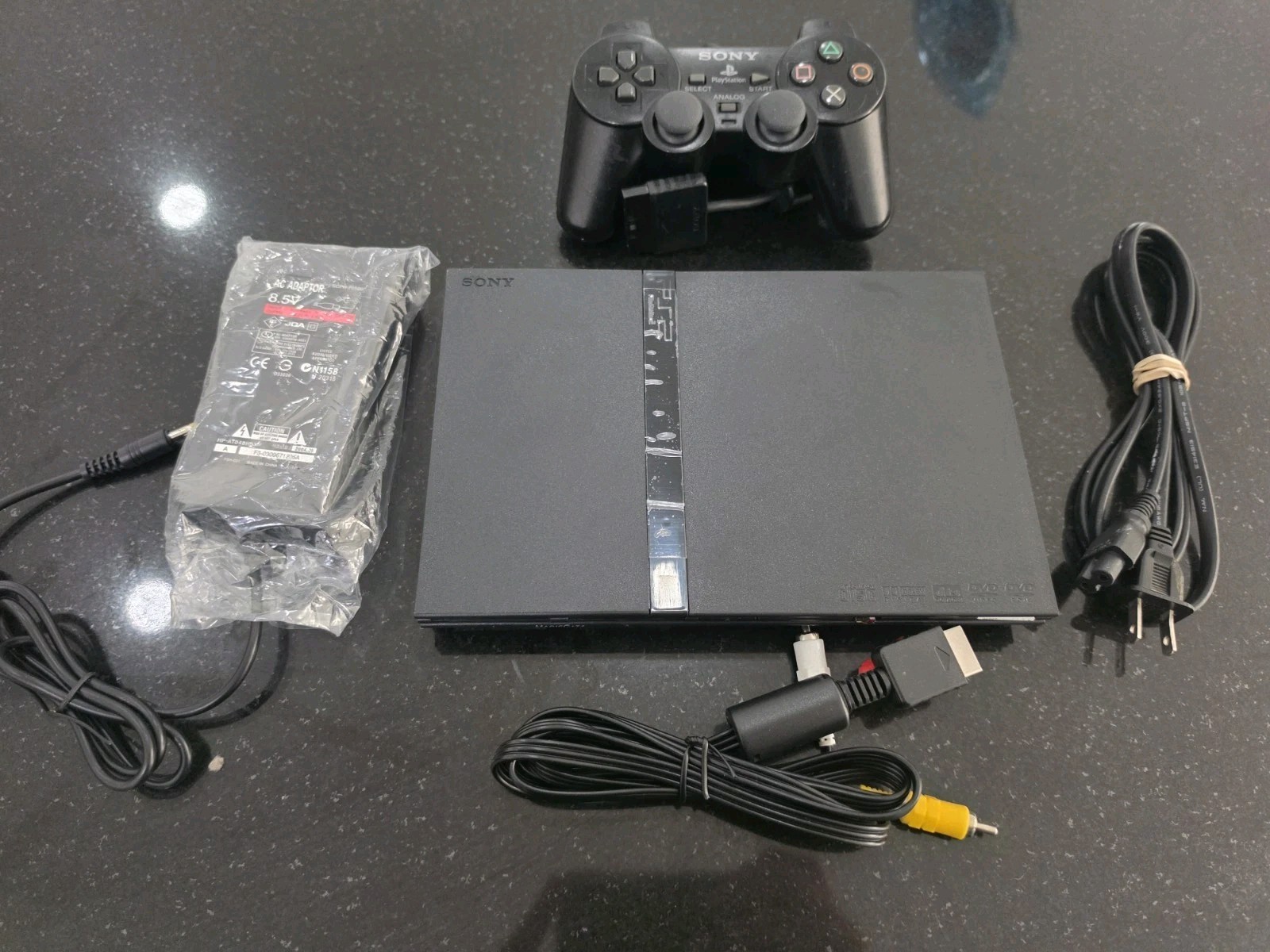 Sony PlayStation 2 PS2 Slim Console Complete. Tested Working. New Shell Sony PlayStation 2 PS2 Slim Console Complete. Tested Working. New Shell