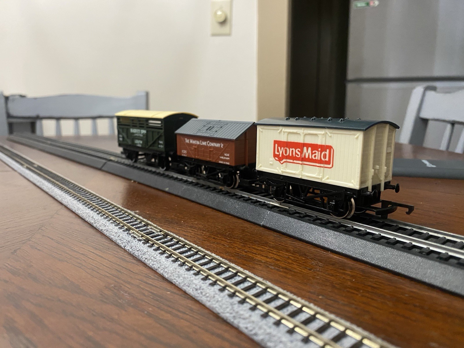 Hornby HO/OO Scale wagons. One cattle van, one salt van, and one Lyons Maid van