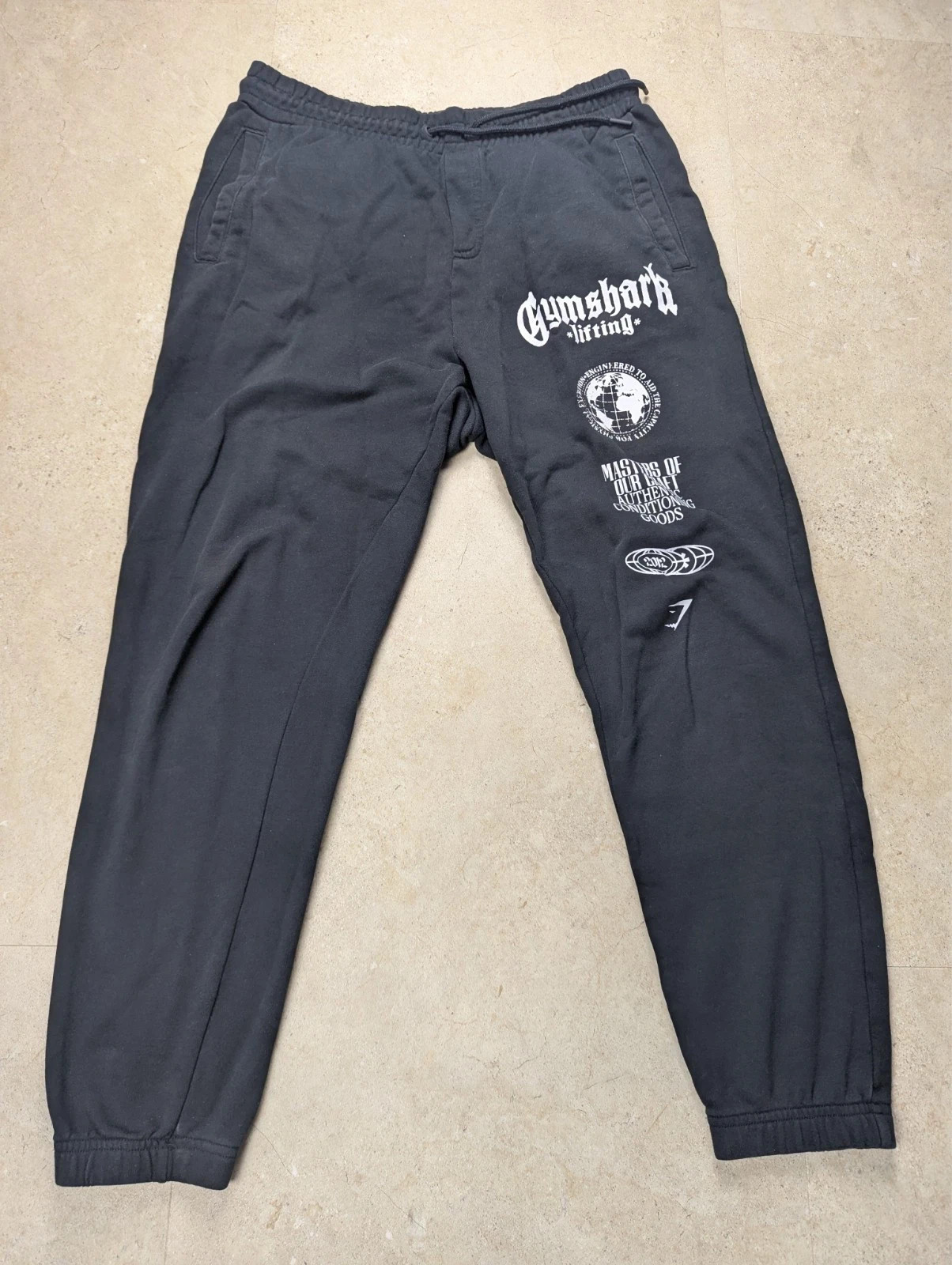 Gymshark Global Lifting Men\'s Joggers Size M Black Graphic Gym Sweatpants