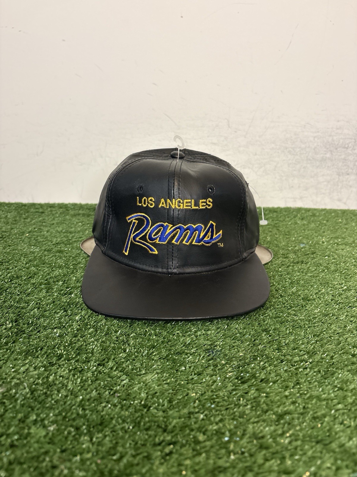 Vintage Los Angeles Rams hat cap strap back black sports specialties script new