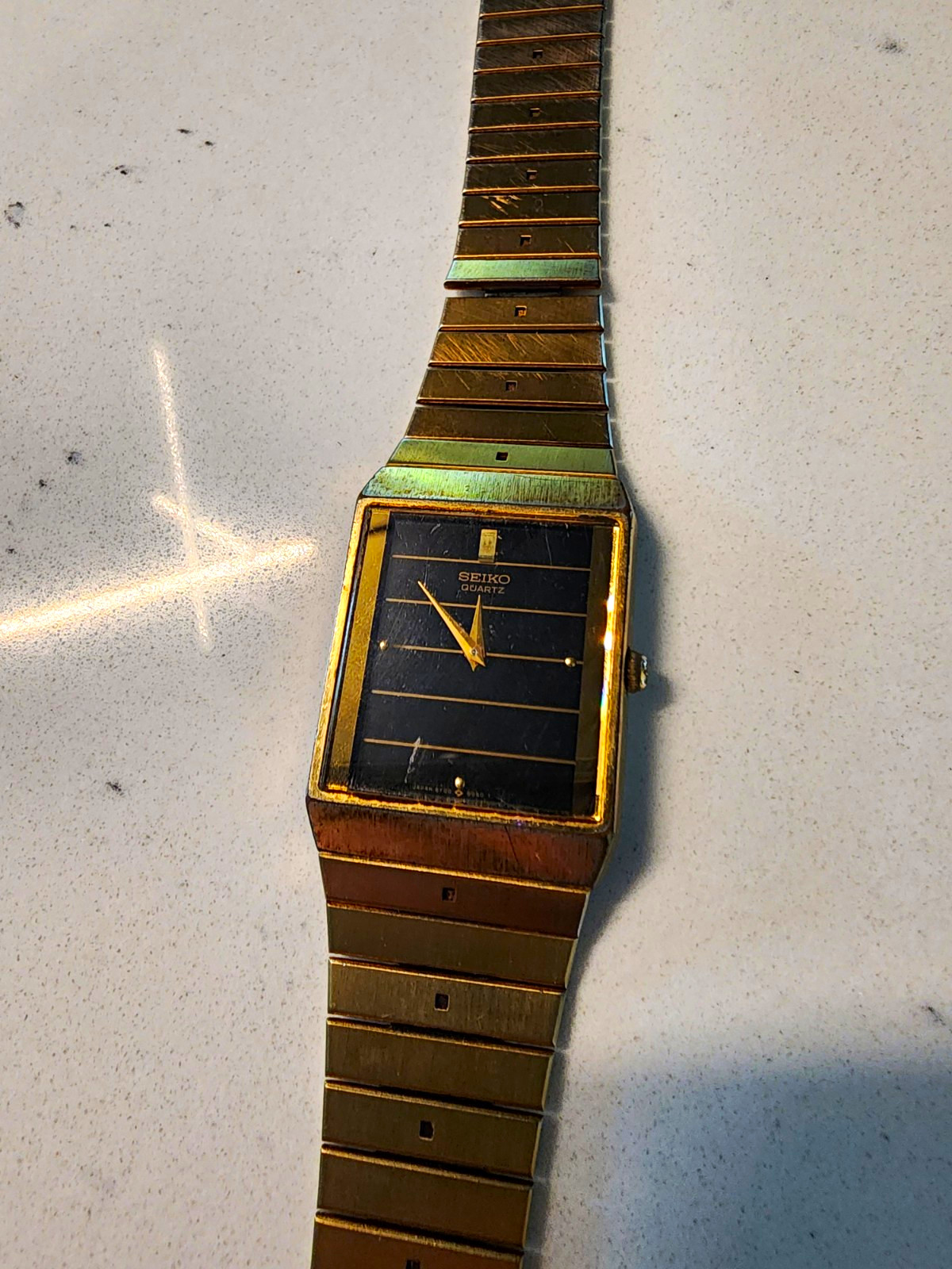 Vintage 1987 Seiko Quartz Tank Watch 5Y30-503H – Gold Tone & Black Dial