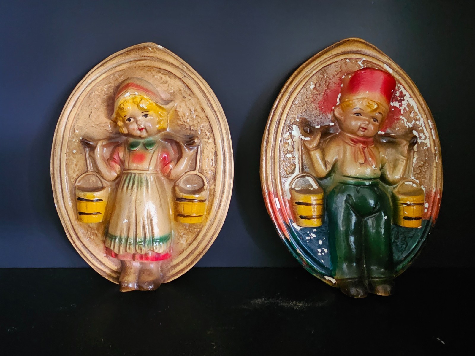 Vintage 1950s Chalkware Dutch Boy & Girl Water Carriers Wall Plaques — Pair Vintage 1950s Chalkware Dutch Boy & Girl Water Carriers Wall Plaques — Pair