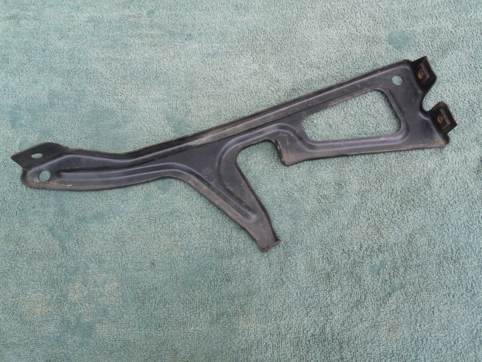 Near NOS GM 1967 Chevy Chevelle Center Grille Support Hood Latch Bracket 3891445