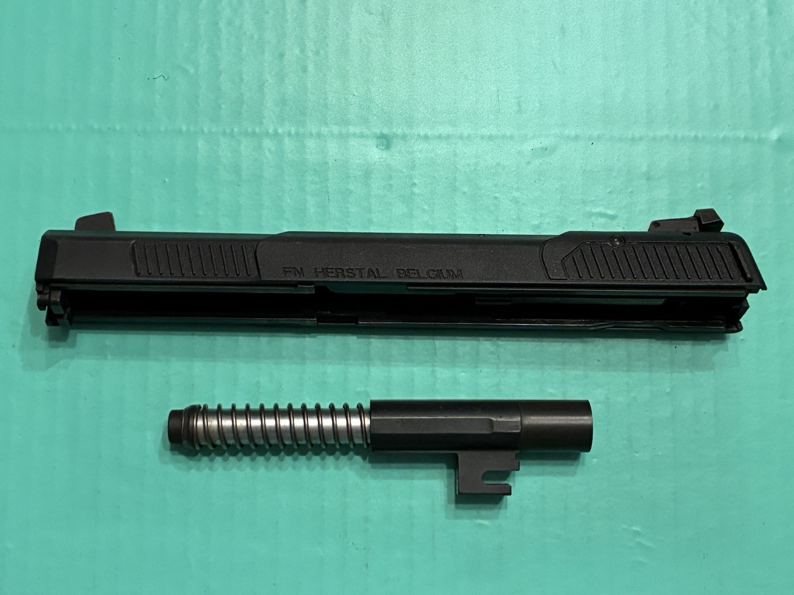 USED OEM FN FIVE SEVEN SLIDE BARREL RECOIL SPRING BLACK FINISH 5.7X28MM MK II